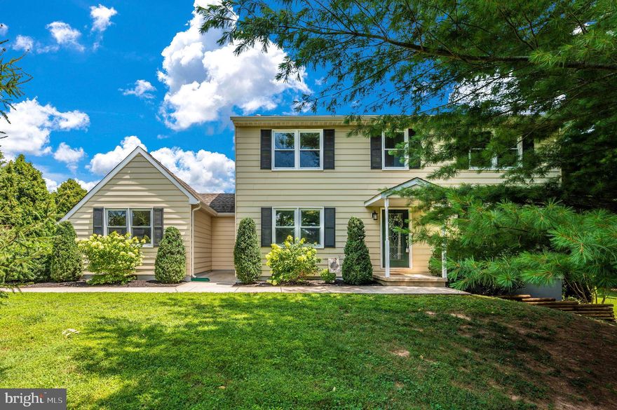 Lovely Colonial Situated on a Private 1.19 Acre Setting Adorned with Beautiful Flowers and Trees!  This Meticulously Maintained Home, Tucked Back at the end of a Cul-de-sac, offers a Tastefully Updated Kitchen with Gorgeous Cherry Cabinets, Cambria Quartz Counters, Attractive Stone Backsplash, SS Appliances,  Farm Sink, Pantry,  Breakfast Nook  w/Sliding  Door to Rear Deck; Large Formal Living Room, Great Room w/Cathedral Ceilings and Wood Stove  (Wall Mounted TV Conveys); Formal Dining Room w/Chair Molding;  ML Powder Room, Rear Mudroom & Entry Door;  Hardwood Floors on Main and Upper Levels; Nice Sized Primary Bedroom with Private Ceramic Bath and Walk-in Closet; 2 Large Additional Bedrooms and Updated Ceramic Hall Bath; Lower Level boasts a Large Rec Room, Den, or Office (Wall Mounted TV Conveys)  w/Walk-out Slider to Side Yard with  Paver Patio;  Additional Finished Room would Make a Great Home Gym or Craft Room, Plus Utility/Laundry Room & Storage;  Deck off Kitchen overlooks the Picture Perfect Level Yard;  All Major Components of home have Been Updated, (HVAC/AC - 2020, New Septic Tank 2019, Roof 2011);  Super Location - Minutes to Mount Airy/Woodbine Shopping, Commuter Routes, Howard County Schools, and West Howard Swim Club!  Just Move Right in and Enjoy this Lovely Home & Property!