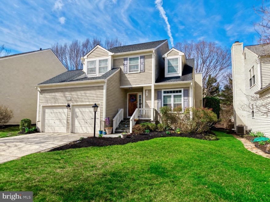 Impressively updated cedar Colonial in the heart of River Hill, one of Howard County’s most sought-after communities, where lifestyle, convenience, and natural beauty come together. This beautifully improved home features rich hickory hardwood flooring, custom REICO cabinetry, granite countertops, porcelain sinks, stone tile, and updated fixtures and finishes throughout, creating a warm and move-in ready interior. The kitchen is enhanced with a GE Profile Advantium Speedcook Oven/Convection Microwave (2024) and GE refrigerator (2023), blending style with everyday functionality. Major system updates provide exceptional peace of mind, including a State ProLine 50-gallon gas water heater (2022), Thompson Creek “Sound Shield” windows installed throughout the entire home (2017), a complete GAF roofing system (2016), Carrier gas furnace with humidifier (2016), Carrier 5-stage air conditioning unit (2016), and new 4-inch gutters and downspouts installed in January 2025. The exterior has also been meticulously maintained with full cedar painting completed in 2023. Outdoor living is equally exceptional with premium slate accents, Brazilian walnut details, and a stunning Ipe mahogany deck with pergola—perfect for relaxing or entertaining while enjoying the peaceful setting. Located just moments from River Hill’s walking paths, tot lots, neighborhood amenities, highly rated schools, and nearby shopping and dining at River Hill Shopping Center, Clarksville Commons, and Clarksville Square, this home offers the ideal blend of refined updates, long-term value, and everyday convenience in one of Clarksville’s premier neighborhoods.