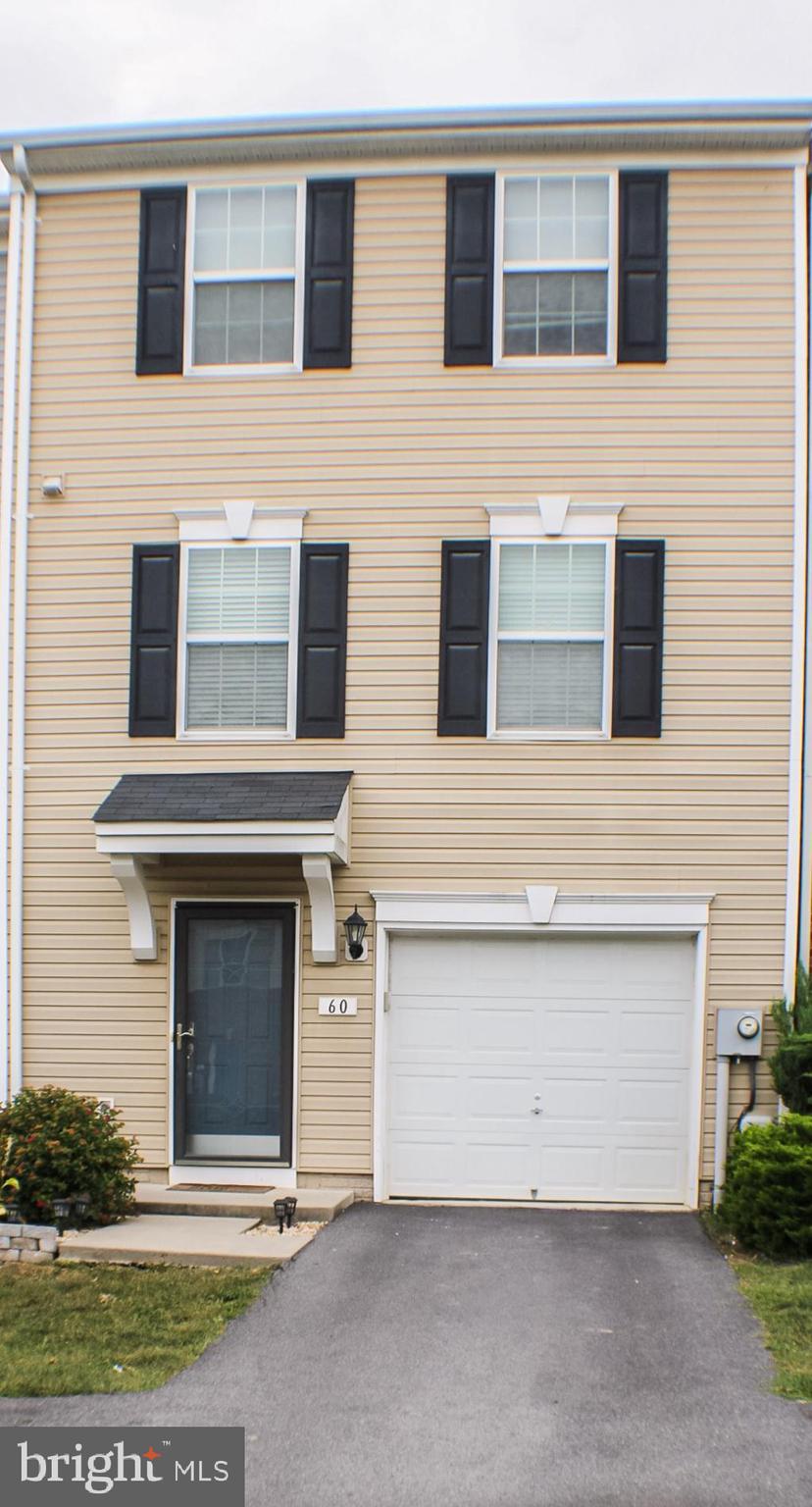 Fully finished three story townhouse located in the beautiful Manor Park. This home is close to schools and about a mile off the interstate. Kitchen has new granite countertops and a breakfast bar with a spacious living room area. Two full bathrooms upstairs one with a large garden tub and walk in shower.