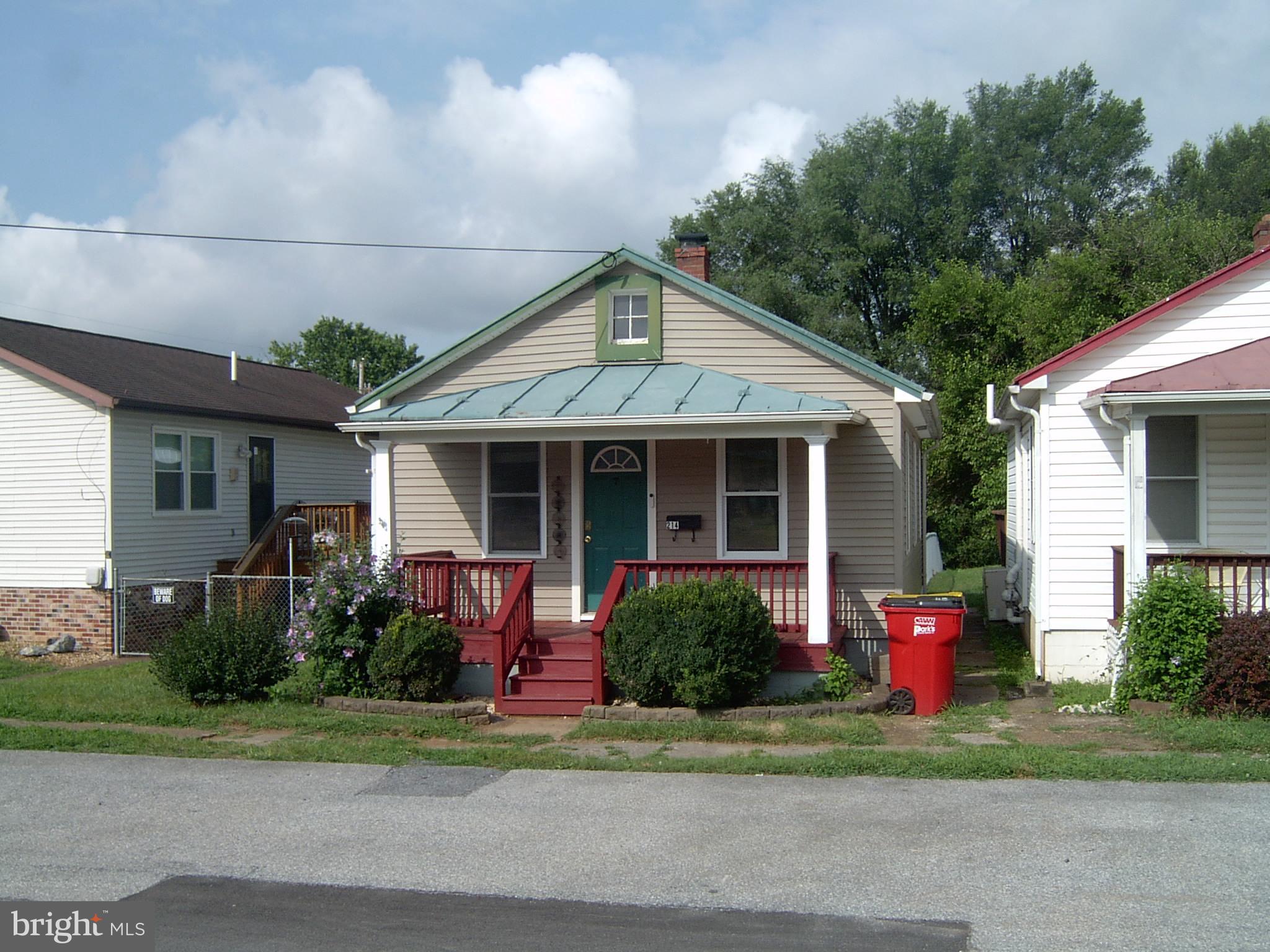 Charming Rancher Just Steps from Historic Downtown Charles Town! This adorable 600 sq ft ranch-style home offers unbeatable convenience and cozy living—all within walking distance to downtown shops, restaurants, and Hollywood Casino. Whether you're just starting out or looking to downsize, this 2-bedroom gem is the perfect fit. Enjoy a welcoming front porch, a rear deck overlooking a fenced backyard, and recent updates that add comfort and peace of mind: HVAC and fence (July 2022) and new dishwasher, new vinyl plank flooring in the living room (Sept 2024), fresh interior paint, new carpet, radon mitigation system, and bidet toilet seat (July 2025). Additional smart home features include a Nest front door camera and Kwikset electronic lock for added security. Don’t miss this move-in-ready home in a prime location! If you're looking to own and no longer paying a landlord this home is for you. Please call today.