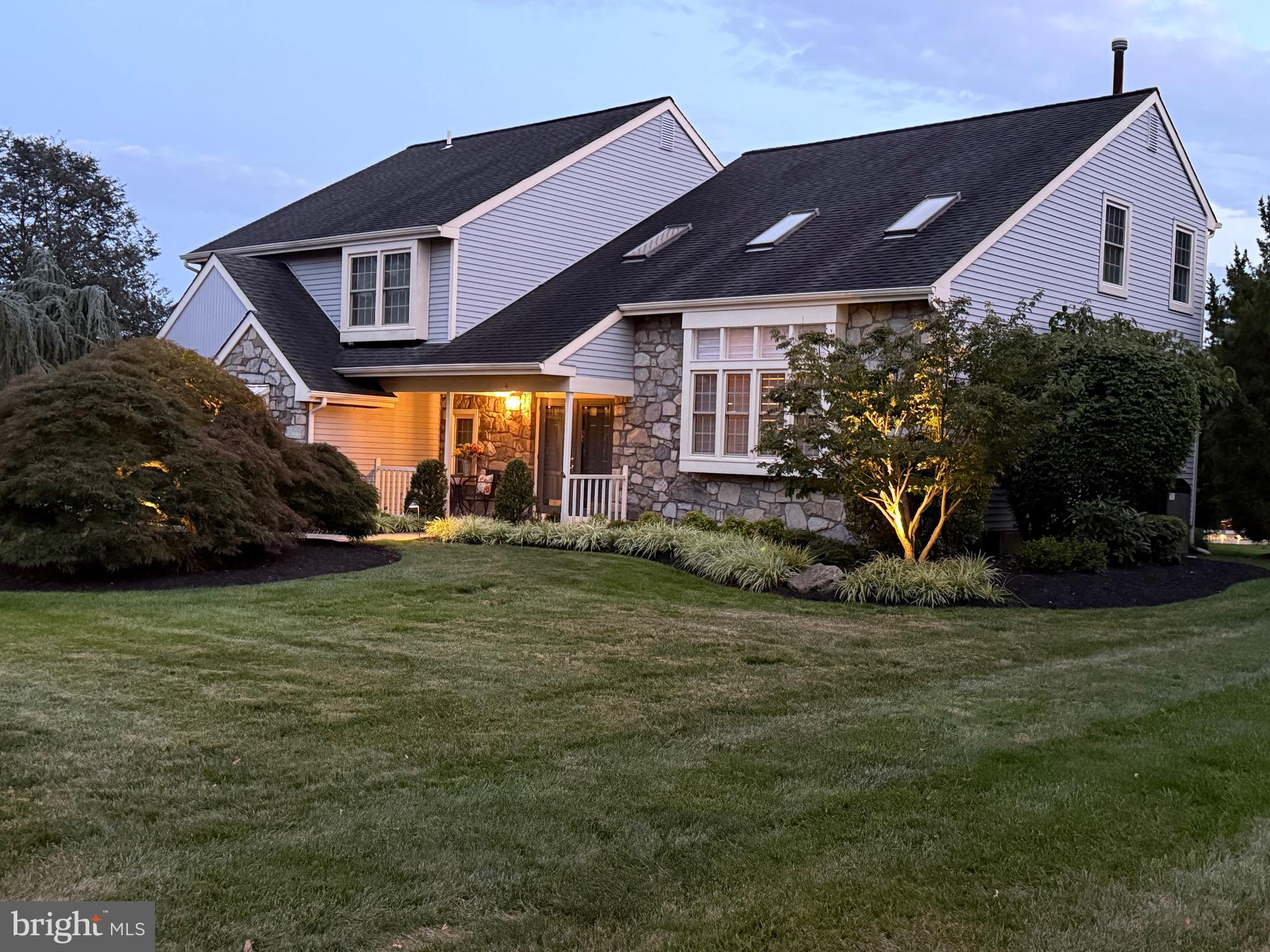 Welcome to 4 Gladiola Cir, a rare find in Newtown Grant that offers 5 second floor bedrooms, a quiet cul de sac homesite and on one of the largest private lots in the community. With a blend of modern comfort and timeless appeal, this impeccable and updated home is an incredible opportunity to call home! Architectural features include a vaulted ceiling Living Room with skylights, spacious Dining Room, a cozy Family Room with a stone gas fireplace and wet bar for entertaining. The primary suite with an updated ensuite bath and walk-in closet, along with the additional well-sized bedrooms and renovated hall bathroom, offer comfort and functionality for the whole family. The finished basement provides ample space for entertainment, workout space and substantial storage. The outdoor space with a spacious two tier deck is perfect for enjoying peaceful entertaining. Significant upgrades include newer HVAC and hot water heater. The extensive community amenities, include a pool, sports courts, club house and scenic trails, enhance the lifestyle offered by living in Newtown Grant. The location's convenience to downtown Newtown, I-295, and the award-winning Council Rock School District make this a great choice for the discerning Buyer looking for the best in community living!