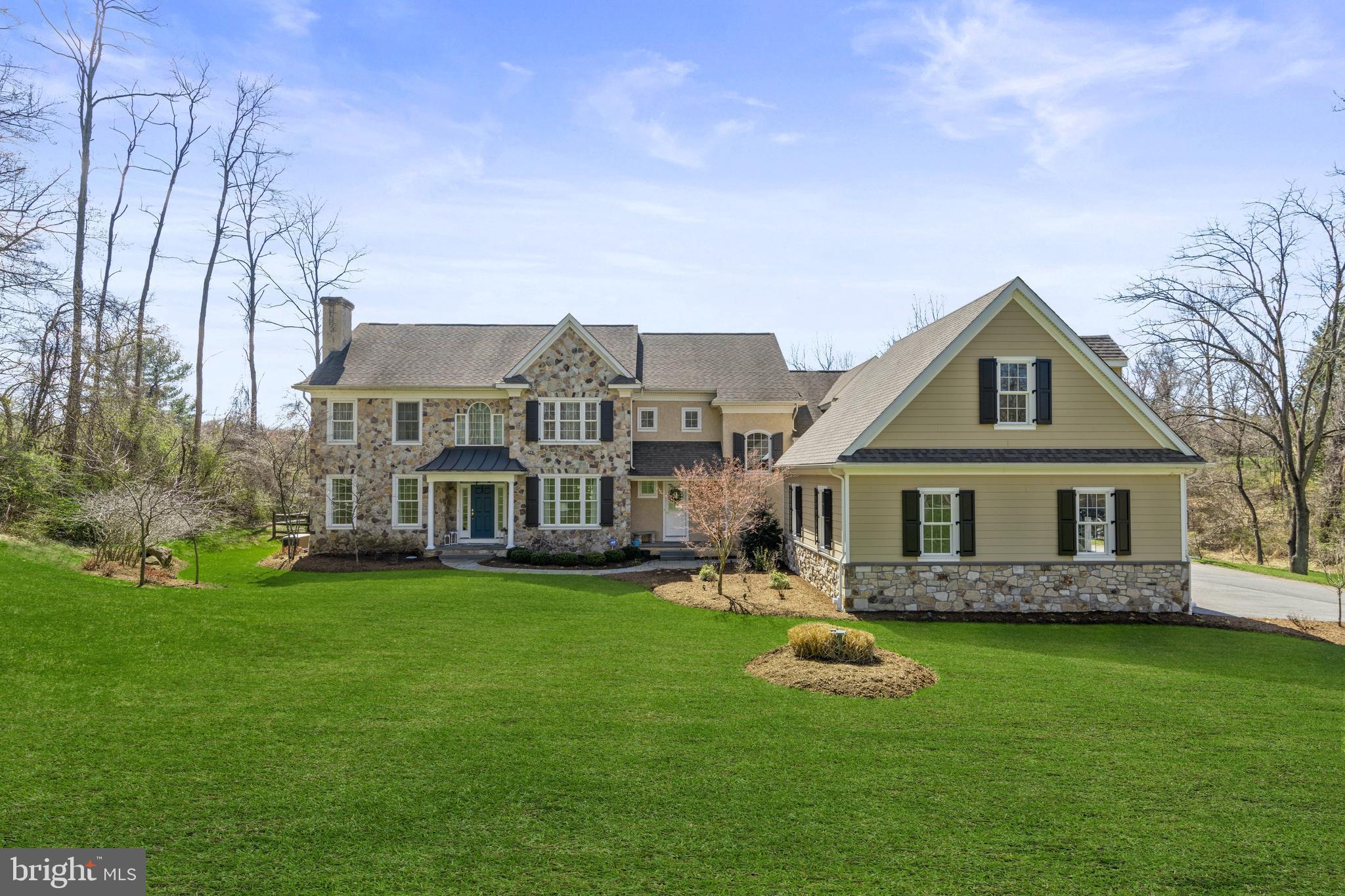 Welcome to 222 Dutton Mill. This classic five bedroom, four full bath and two half bath Pennsylvania Farmhouse colonial sits on 2.3 tranquil acres. Once inside, you are greeted with on site finished hardwood floors throughout the first floor. The classic center hall entry presents a formal dining room to the right and formal living room to the left with gas burning fireplace. From the formal living room, French doors lead you to the home office with plenty of windows overlooking the backyard and access to a half bath. The family room with gas burning fireplace is open to the custom eat in kitchen. The kitchen features everything you would expect in a home of this caliber. Inset custom cabinetry, soft close drawers, classic white subway tile backsplash, farmhouse sink, 6 burner Viking stove top range. Cabinet grade finished refrigerator and dishwasher, Kitchenaid double wall ovens with convection cooking. The eat in kitchen area brings tons of light into the heart of the home through large windows overlooking your backyard oasis. The backyard is sure to be the place that will create memories for years to come. The covered blue stone patio with wet bar area is located just off of the eat in kitchen area, perfectly situated to allow for easy flow for large family gatherings or family night just making smores by the fire pit. If you are looking for your own private oasis, look no further, this backyard will make you never want to leave home. The pool setting with extensive landscaping will only get better as the summer season closes in. Upstairs you will find five bedrooms and four full bathrooms. Hardwood flooring throughout with the exception of two bedrooms. Two bedrooms share an adjoined bathroom, while two others have their own full baths. The Main Bedroom has plenty of closet space and a tastefully renovated five piece bathroom with vessel bathtub. The laundry room resides on this floor, a must have for today's busy lifestyle. A partially finished basement provides high ceilings and two daylight egress windows, with plenty of space to entertain if needed. There is also plenty of basement storage with bilco door access to the pool area for ease of bringing in pool furniture or equipment at the end of the season.   The current owners have lovingly renovated this home since their ownership in 2012. Renovations include, custom kitchen, all bathrooms, covered patio area, 24,000 gallon pebble tec pool, extensive landscaping with 3 zone sound system, detached oversized two car garage with attic space above that could easily be converted into a guest suite. Two new HVAC units in 2020, Hot water heater 2020, Kohler whole house generator in 2014. Custom mudroom lockers with power. If you have been looking for a home that has it all with minimal renovation required, look no further. Although the zip code is West Chester, this home is part of the award winning Great Valley School District.