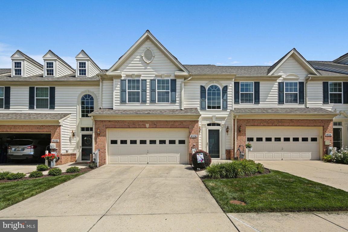 MAJOR PRICE ADJUSTMENT! Welcome home to this stunning and well-maintained 3 level villa with a two car garage in the sought-after 55+ community of Hearthstone at Ellicott Mills. Situated at the end of a quiet cul de sac, and backing to conservation land trees, this is the one you have been waiting for! The main level features an open floor plan with 10 foot ceilings and a gourmet eat-in kitchen with granite counters, stainless steel appliances and a center island, leading to the great room with hardwood floor and a private scenic view to the conservation land. The main level also features the primary suite with hardwood floors, a walk-in closet and a primary bathroom with dual sinks and an expansive tiled double shower. The main level is further complemented by a separate dining room with hardwood floor and a vaulted ceiling, along with a half bath. Upstairs you will find two roomy and bright bedrooms, one of which has a walk-in closet, as well as the second full bath, a large loft overlooking the great room, and extra space for storage. The walkout lower level is fully finished with a large rec room, separate office, a half bath, and a laundry room and storage area. Meticulously maintained. New roof in 2023. This property provides peace and privacy while still being close to all of the amenities of Ellicott City. Come see this amazing property and enjoy the maintenance-free lifestyle in a serene, welcoming environment tailored to 55+ residents.