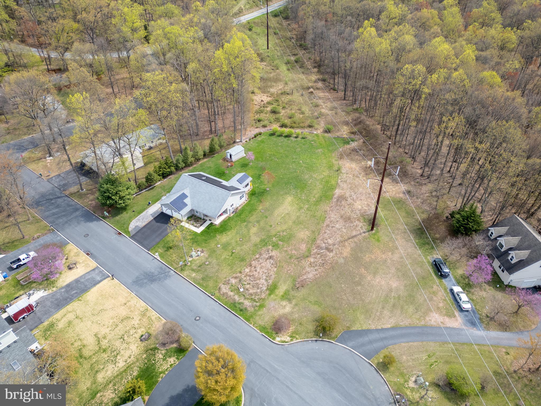 You'll definitely want to consider this beautiful .88 acre lot in the beautiful Colonial Woods neighborhood to build your new home! This West Shore School District property is right off Big Spring Rd. Not quite enough acreage? There is another lot that is 1 acres that connects to the back of this one that is also for sale. (Lot 101b Elder Trail)