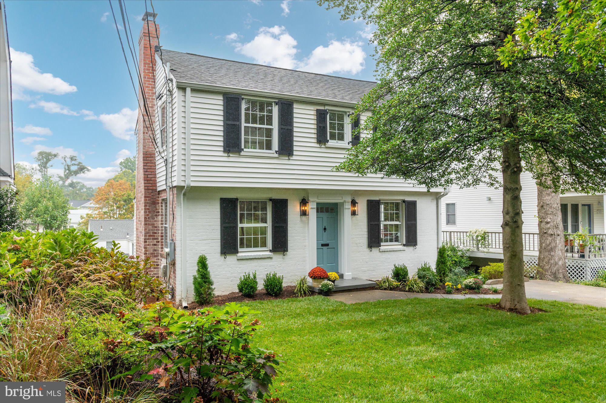 FIRST OPEN: SATURDAY, SEPT. 13TH - 2-4! Beautifully situated on a leafy stretch of Turner Lane, this classic colonial in the Village of Martins Additions is just steps away from everything that makes this neighborhood so special. Chevy Chase Park (known locally as Shepherd Park), The Shops on Brookville, and the neighborhood favorite La Ferme Restaurant are all nearby. On Saturday mornings, you can enjoy the farmers’ market on Taylor Street! Built in 1952, the home blends timeless character with a smart, flowing floor plan. Sunlight fills the living room, where a wood-burning fireplace makes for a perfect spot on fall evenings. Just off the living room is a versatile den – ideal for a home office or quiet retreat. The main level also features a refreshed powder room and a formal dining room with space to host gatherings both large and small. The kitchen has been updated with quartz countertops, decorative backsplash, and stainless-steel appliances, offering a bright, functional space for everyday cooking, family time, and entertaining. Right off the kitchen, a deck overlooks the backyard – large enough for gardening, play, and enjoying the outdoors, with room to make it your own. Upstairs, you will find three bedrooms and a beautifully renovated hall bath. The fully finished walk-out basement adds even more living space, with new carpeting, a recreation room, a laundry area, ample storage, and a newly added full bath. Additional highlights include a private driveway with space for two cars, providing the convenience of off-street parking. From its sun-filled rooms to its flexible outdoor spaces, this move-in-ready home offers refreshing updates and classic charm in one of the most sought-after neighborhoods in the DC area. Welcome home to 3501 Turner Lane!
