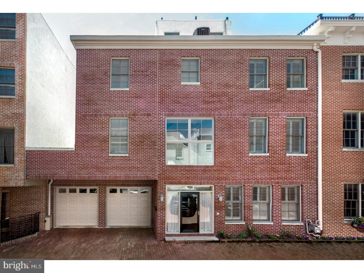 LOCATED ON S. 2ND STREET BETWEEN QUEEN AND CHRISTIAN. Welcome to the finest city living you will find with over 4300 square feet of living space in the Meredith School Catchment area. This unique modern home offers 4 bedrooms, 5 full baths, 1 powder room, a two car garage and numerous outdoor spaces in a gated community in Queen Village. Pull into your oversized two car garage or step through the front door and you are immediately greeted by the expansive floor plan and cathedral ceiling entrance. Head into the chef's kitchen with an enormous island, a Liebherr refrigerator with wine fridge, 48 " capital stove with two ovens, 6 burners and griddle, and a Bosch dishwasher. The kitchen area leads outside to a beautiful and private patio with stone pavers. An attractive powder room, dining room and double coat closet complete this level. Walk up one flight to an immense living room with gas fire place, two outside patios, a full bathroom and an additional bedroom. Continue up to the next floor which has an oversized master bedroom, two walk in closets and a master bath with upscale fixtures and finishes. A second bedroom with a private bath plus a convenient laundry room complete this floor. The top floor has the 4th bedroom, full bath and doors leading out to two private decks with stunning views. Finally, the finished basement with high ceilings is ideal for an in-law suite, media room and/or gym. A full bath and multiple closets for extra storage complete this dream home. Walking distance to many restaurants, bars, cafes, playgrounds and the Delaware River waterfront.