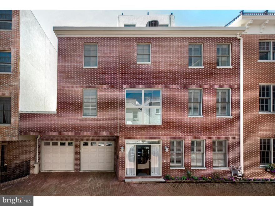 LOCATED ON S. 2ND STREET BETWEEN QUEEN AND CHRISTIAN. Welcome to the finest city living you will find with over 4300 square feet of living space in the Meredith School Catchment area. This unique modern home offers 4 bedrooms, 5 full baths, 1 powder room, a two car garage and numerous outdoor spaces in a gated community in Queen Village. Pull into your oversized two car garage or step through the front door and you are immediately greeted by the expansive floor plan and cathedral ceiling entrance. Head into the chef's kitchen with an enormous island, a Liebherr refrigerator with wine fridge, 48 " capital stove with two ovens, 6 burners and griddle, and a Bosch dishwasher.  The kitchen area leads outside to a beautiful and private patio with stone pavers. An attractive powder room, dining room and double coat closet complete this level.  Walk up one flight to an immense living room with gas fire place, two outside patios, a full bathroom and an additional bedroom. Continue up to the next floor which has an oversized master bedroom, two walk in closets and a master bath with upscale fixtures and finishes. A second bedroom with a private bath plus a convenient laundry room complete this floor. The top floor has the 4th bedroom, full bath and doors leading out to two private decks with stunning views. Finally, the finished basement with high ceilings is ideal for an in-law suite, media room and/or gym. A full bath and multiple closets for extra storage complete this dream home. Walking distance to many restaurants, bars, cafes, playgrounds and the Delaware River waterfront.