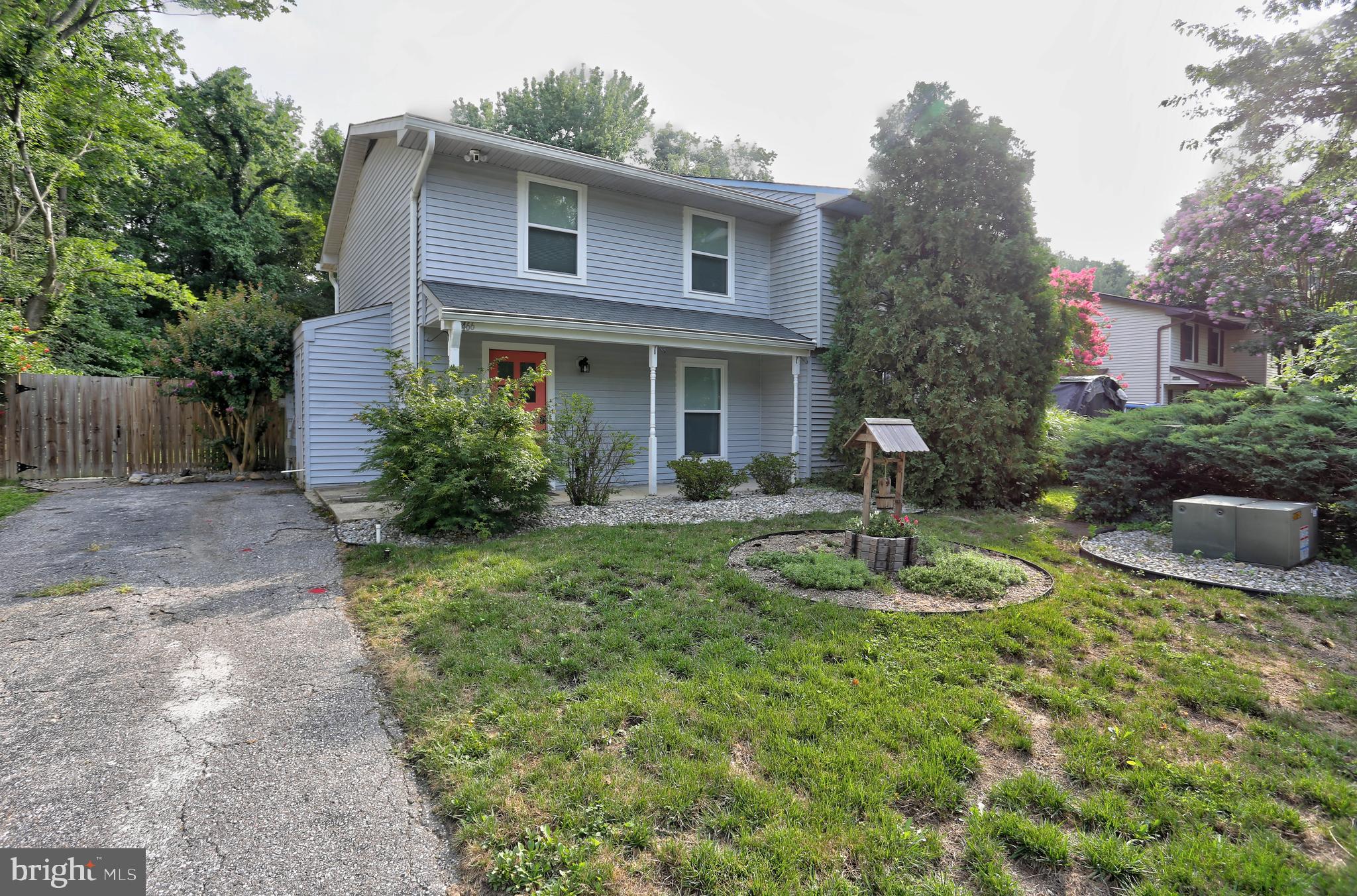 Charming 3 Bed, 1.5 Bath in desirable Revell Downs! Home boasts a beautiful, spacious kitchen with new cabinets & granite counters and a large pantry/washroom with XL Washer & Dryer. Separate dining area. Family room with new built in cabinets and beautiful electric fireplace. Large primary bedroom with en-suite half bath and room to install a shower, 2 spare bedrooms and newly updated full hall bath. Enjoy the beautiful curb appeal and tranquility on your covered front porch off a quiet side street. Entertain in the large, private, fully fenced rear yard backing to woods or complete those weekend projects in your huge electric capable shed/workshop. Concrete patio extension is set up and ready to pour! So many updates throughout including newer windows, front door, hot water heater, main level LVP and upper level carpet. Home is freshly painted throughout and professionally cleaned! Broadneck school system! Fantastic neighborhood location, walking distance from Bay Head Park and just around the corner from Sandy Point Beach! So quiet you won't believe you're just off Rt 50 for an easy work day commute or weekend fun shopping/dining minutes from downtown Annapolis!