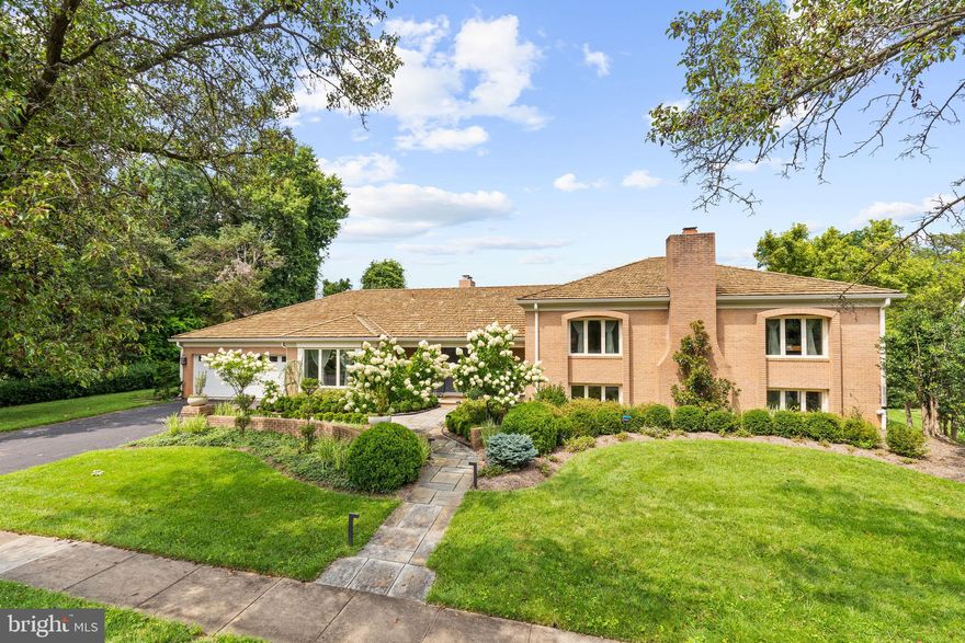 Located in highly sought after Evermay, this striking split-level home has been meticulously renovated and expanded with custom details throughout. The sun-filled property is situated on a quiet end lot, behind professional landscaping and offers gracious living on three finished levels. The traditional yet open concept main floor, complete with porcelain flooring, crown moldings and high ceilings, includes a formal living and dining room with gas fireplace adjoining the family room. The gourmet kitchen features top-of-the-line stainless steel Thermador appliances, wine fridge and large island with bar seating which opens into the cozy family room with beamed ceilings, exposed brick and a gas fireplace. The newly constructed dining room offers walls of windows overlooking the pool and immediate patio access. Upstairs, the expansive primary suite includes gleaming refinished hardwood floors, a private vanity and walk-in closet for each owner with a sizable glass framed shower meeting in the middle. This level also includes two additional bedrooms with a connecting bathroom, double vanity and glass shower. The fully-finished walkout lower level offers abundant entertaining space complete with a recreation room, wood burning fireplace and wet-bar. The level also includes two additional guest rooms with a connecting bathroom. An exceptionally deep backyard with a serene in-ground pool and spacious patio provides ample space for outdoor entertaining. A bonus pool house, capacious storage throughout and a two-car garage completes the offering. 6280 Dunaway Court is situated within easy access to the George Washington Parkway, Tyson’s Corner and the Silver Line metro station.