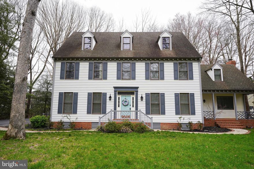 Welcome home to 5545 Royal Mile Blvd, located in the prestigious neighborhood of West Nithsdale! This classic Colonial home with a tasteful contemporary feel is waiting for its new owners to come and introduce themselves! The fusion of old and new really come together in this recently updated home, where you'll find all the modernization you need while retaining that classic Colonial feel. 

Upon entering, you're greeted by a spacious foyer and stairs, with access to the den, formal dining room and kitchen, with real hardwood floors guiding you throughout the majority of the first level of the home. 

The kitchen features quartz countertops, stainless steel appliances, subway tile backsplash, and ample recessed lighting, while maintaining a warm cozy feel. Situated off the kitchen is a large breakfast area, pantry, and access to the rear screened-in porch, equipped with brick paver flooring for a classic yet sturdy feel. 

Situated adjacent to the kitchen/breakfast area, you'll find the formal dining room, accented with a modern yet classic chandelier, chair railing, and multiple windows, providing lots of warm natural light.  

Continuing on from the breakfast area is a huge family room equipped with a brick fireplace, and separate doors leading to both a small front portico perfect for porch-sitting, and the rear deck access leading to the back yard. 

Off the kitchen and foyer, you'll find a den perfect for additional flex space, whether it be a home office, second living room, or perhaps a quiet library.  Rounding out the first floor, you'll also find a half-bath just off the side entry to the home, and a large laundry room with access directly to the two-car garage. 

Upstairs, you'll find the owner’s suite, which is oversized and supplemented with a large walk-in closet and en-suite bathroom.  This luxurious bathroom features herringbone-pattern tile flooring, double vanity accented with subway tile, a large walk-in shower with a built-in alcove for storage, a stone-topped bench, and rainshower shower-head.  Or you can soak in the standalone soaking tub accented with a wall-mounted TV and an ornate chandelier to boot!  The toilet room is separate, and has its own built-in linen closet.

Also upstairs you'll find 3 additional large bedrooms, a common bathroom featuring a tiled tub/shower combo, ornate vanity, and large ceramic floor tiling. 

Don't miss the surprise bonus space!  There’s a 3rd floor unfinished 749 square feet area with dormer windows for plenty of natural light.  It’s just waiting to be developed into a home theater, office space, or perhaps a kids’ hangout.

Still need more storage space?  There’s walk-up attic over the garage, so you can ditch the storage unit rental with confidence. 

In back of the home, there’s a large rear deck with a screened-in porch, a huge fenced-in area of the backyard with an open view of the trees behind the home that’s perfect for entertaining or spending a relaxing evening taking in the serene sounds of quiet Eastern Shore living.

Leave worry behind, as this home has been meticulously upgraded and maintained throughout the years, with recent improvements featuring a new septic system in 2021, a new water heater in 2023, and regular system well-checks and maintenance.  

The West Nithsdale neighborhood is located just minutes outside of the rapidly growing downtown scene that Salisbury has been working hard to achieve in past years. You'll find yourself just minutes from a plethora of options for shopping, dining, healthcare, schools, and recreational activities, and it’s less than an hour’s drive to the Maryland and Delaware beaches at Ocean City, Assateague Island, and Fenwick Island. 

This beautiful home is ready for the passing of the torch to its lucky new owners…you just need to come by and introduce yourself! Call today to schedule your own private tour!