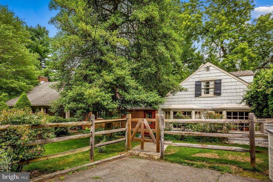 Come view this cozy cottage situated on a beautifully landscaped 1.14 acre corner lot in the heart of Ruxton. This cottage has two (2) distinct wings that are connected by a galley kitchen. The 1st floor of the West wing consists of a Great Room w/ a 17' high vaulted ceiling with pine planking, built-in bookcases, 3 skylights and a raised hearth brick fireplace that will require some repair. A dining area + a bedroom (Currently used as an office) and powder room are adjacent to this space --- The 22' Primary bedroom is also on the 1st level and has pegged flooring, a vaulted ceiling, built-in cabinets, 2 closets and a wood burning fireplace that will require some repair --- The bath that serves the Primary bedroom has a tub/shower combination, large linen closet & recessed lighting. On the 2nd floor of the West wing is a catwalk leading to a 17' bedroom w/ a skylight, pine flooring & a half bath. The 21' galley kitchen has granite countertops, pine planking and an assortment of appliances w/ access to the oversized flagstone courtyard. The 1st floor of the East wing consists of a 19' family room w/ 2 bay windows, a ventless gas fireplace and access to a 2nd full bath w/ a tiled, tub & shower combination. A 4th 19' bedroom is on the 2nd level w/ pine planks, a skylight & built-in shelves. The property is serviced by public water and a private septic system --- When you arrive at the house you will see straw covering part of the property - That is the area where NEW drain fields have just been installed --- Relax on the covered front porch or the flagstone courtyard --- A driveway provides ample parking for 2 cars. The seller is selling this property "AS-IS" --- Any and all inspections are welcomed.
