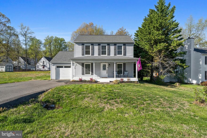 Look no further!! This charming colonial / coastal cottage is just what you are looking for! Explore serene living nestled in the sought after community of North Beach, MD. Make your way into the remarkable main level, a sophisticated blend of LVP flooring and and an open floor plan...creating a fine interior you’ll want to linger in.  Entertaining is a breeze from the cozy family room with crown molding to the chic office/main level bedroom.  Kitchen is perfect for the chef of the family w/  SS appliances, quartz countertops, recess lighting, and backsplash. Kitchen nook with wainscoting adds an extra flare... just one of the many details in this home. Kitchen w/ slider leading to composite deck and private backyard. Your outdoor oasis awaits with plenty of yard space for play, relaxation, and summer cookouts. Main level also includes laundry, updated half bath and door leading to garage. Upper level boasts 2 modestly sized bedrooms, walk in closet, ceiling fans, and and a centrally located bathroom w/ upgraded vanity. No details were missed in this one! Close proximity to schools, shopping, restaurants, and more! Schedule your showing today!!! Updates include: windows 2024, roof about 5 years old, kitchen completely updated in 2024, flooring 2024.