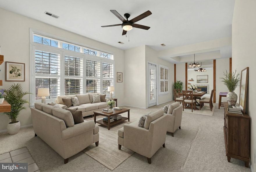 Nestled in the heart of Owings Mills New Town, this gated community offers a resort-style lifestyle with a pool, tennis courts, clubhouse, playground, dog park, and scenic walking paths. First floor condo with NO STEPS. This spacious 2-bedroom, 2-bath condo is filled with natural light and ready for your personal touch. Enjoy a gas fireplace, tray ceiling, private balcony, and open living and dining areas perfect for relaxing or entertaining.

The primary suite features double closets (including a walk-in), a dual vanity, and a walk-in shower. The second bedroom includes built-ins and access to an updated hall bath. New Carpet (2025) and a new water heater (2025) add value and comfort. Move-in ready for you to personalize the space your way.

Enjoy secure garage parking, elevator access, and a convenient location just minutes to shopping, dining, fitness centers, and major routes I-795, I-695, and I-83. Move in now and make this condo your perfect Owings Mills retreat!