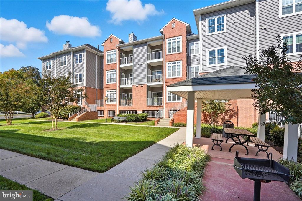 Photo of 9002 Groffs Mill Drive #9002, OWINGS MILLS, MD 21117 (MLS # MDBC2142286)