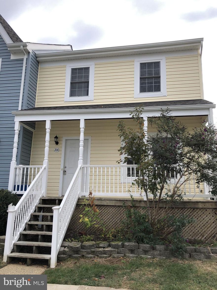 Experience low-maintenance living in this fantastic end-unit condo. Entire home has been freshly painted and is move-in ready. With two large bedrooms, an eat-in kitchen, a cozy front porch and back deck. Plenty of storage room in the unfinished basement. Enjoy the added perks of two assigned parking spaces, water, trash removal and exterior maintenance are included in condo dues. Ideally located close to shopping, dining, and the back gate of Quantico.