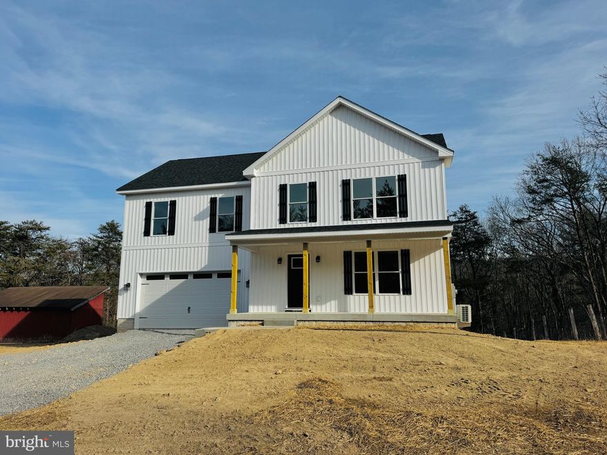 No HOA and Located off of State Maintained Road!!! Just Completed Brand New Colonial Style Home on 2.39 Acres of land.  Welcome home to your new home! This home offers modern amenities and a spacious layout. Key Features: Spacious Living Area: this home provides ample room for relaxation and entertainment. Over 2240 finished area of living space * Gourmet Kitchen: Enjoy cooking in a beautiful open kitchen with granite countertops and stainless-steel appliances. * Comfortable Bedrooms: Four generously sized bedrooms ensure everyone has their own space. * Modern Amenities: HVAC system for year-round comfort.  Full Basement: Unfinished walk-out basement offering potential for customization rough-plumbed for full bath. *Outside amenities:  partially fenced yard with  and barn waiting for your future animals 
Location: Enjoy the best of Berkeley Springs with easy access to local amenities and entertainment options. Only about 35 minutes from Winchester, VA. Don't miss out on this fantastic opportunity to own a brand-new home in a prime location. Contact us today to schedule a viewing!