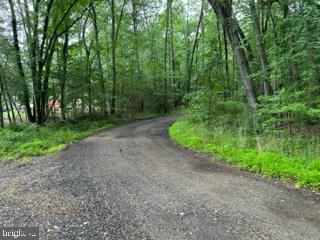LOT IS AT THE CORNER OF ROCK POINT RD (ROUTE 257) AND VENEY PLACE