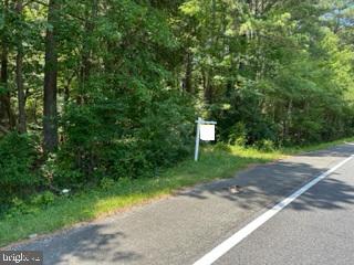 LOT IS AT THE CORNER OF ROCK POINT RD (ROUTE 257) AND VENEY PLACE