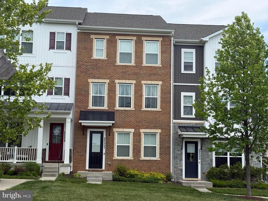 Welcome to this stunning 4-bedroom, 3.5-bath townhome located in the highly sought-after Cabin Branch community! This beautifully designed home offers the perfect blend of comfort, style, and functionality.

The entry level features a spacious foyer and a private first-floor bedroom with a full bath — ideal for guests, a home office, or personal gym space. The oversized 2-car garage includes two additional parking pad spaces for added convenience.

The heart of the home is the gourmet kitchen, complete with stainless steel appliances, a farmhouse sink, double oven range, quartz countertops, a kitchen island and a large walk-in pantry,  Step outside to enjoy the deck just off the kitchen — perfect for morning coffee or entertaining guests.

The open-concept main level showcases beautiful engineered hardwood floors throughout, along with a formal dining area and a spacious family room filled with natural light, creating an inviting space for gatherings and everyday living.

Upstairs, retreat to the luxurious owner’s suite featuring dual his-and-her closets and generous living space. Additional bedrooms provide plenty of room for family, guests, or flexible living needs. 

Located in the vibrant Cabin Branch community with easy access to shopping, dining, parks, and commuter routes, this exceptional townhome truly has it all!