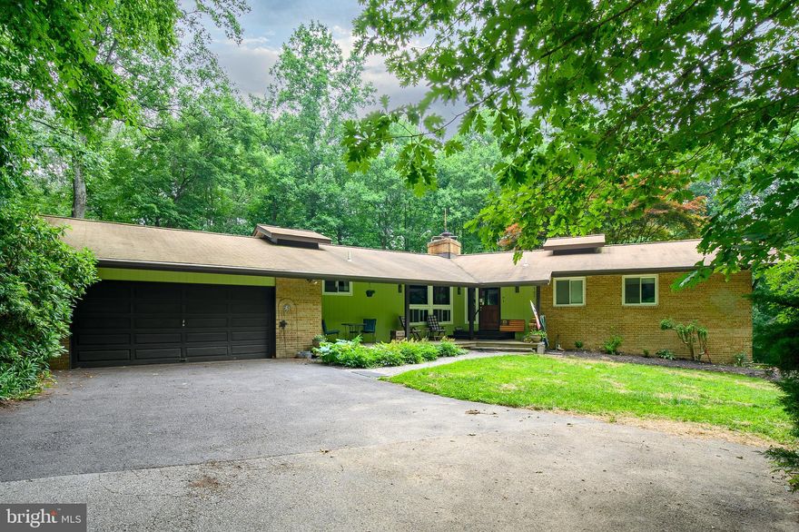 5 Bed 2.5 Bath 4450 sqft
Welcome to your own private oasis in Dayton! This custom-built, contemporary home is truly
one-of-a-kind. Situated on a sprawling  5-acre wooded lot, just steps from the Triadelphia
Reservoir and Pigtail Recreation/boat ramp, which offers the perfect blend of privacy, freedom
and convenience. Step inside and be captivated by the unique contemporary design, featuring
elegant architectural brick focal walls in the foyer, dining, and living room. The abundance of
large windows floods the entire living room and dining room with natural light, creating a warm
and inviting atmosphere. The main level boasts a spacious living room with a fireplace and a
wood stove, perfect for cozy evenings. The extra-large custom deck off the living room is ideal
for entertaining guests or simply enjoying the serene surroundings. The updated kitchen
features stainless steel appliances, a walk-in pantry, and a convenient powder room. Two
bedrooms with a full bath complete the main floor.

Head downstairs to discover three additional bedrooms, another full bath, a large great room
with fireplace and patio sliders, a utility room with built-in storage, and a separate workshop
with 240v electrical service. Outside, you will find a wooded lot with lush lawns, an outdoor fire
pit, and a jacuzzi, creating the ultimate outdoor retreat. The large garage with three bays
provides ample space for parking and storage. Located just minutes away from restaurants,
stores, and schools (both Glenelg, and River Hill High schools pick up here), this property offers
the perfect balance of tranquility and convenience.

Don't miss your chance to rent this truly unique home. For your convenience, the owners have
a home warranty on all systems and appliances, so no hassles with getting things fixed, and
Spring and fall clean up and mulching service to keep the property looking beautiful.
Washer/Dryer and Stand up Freezer convey.

Prefer no cats, dogs ok, all on a case-by-case basis.

All Peace of Mind residents are enrolled in the Resident Benefits Package (RBP) for
$45.95/month which includes renters insurance, HVAC air filter delivery (for applicable
properties), credit building to help boost your credit score with timely rent payments, $1M
Identity Protection, move-in concierge service making utility connection and home service
setup a breeze during your move-in, our best-in-class resident rewards program, and much
more! More details upon application.