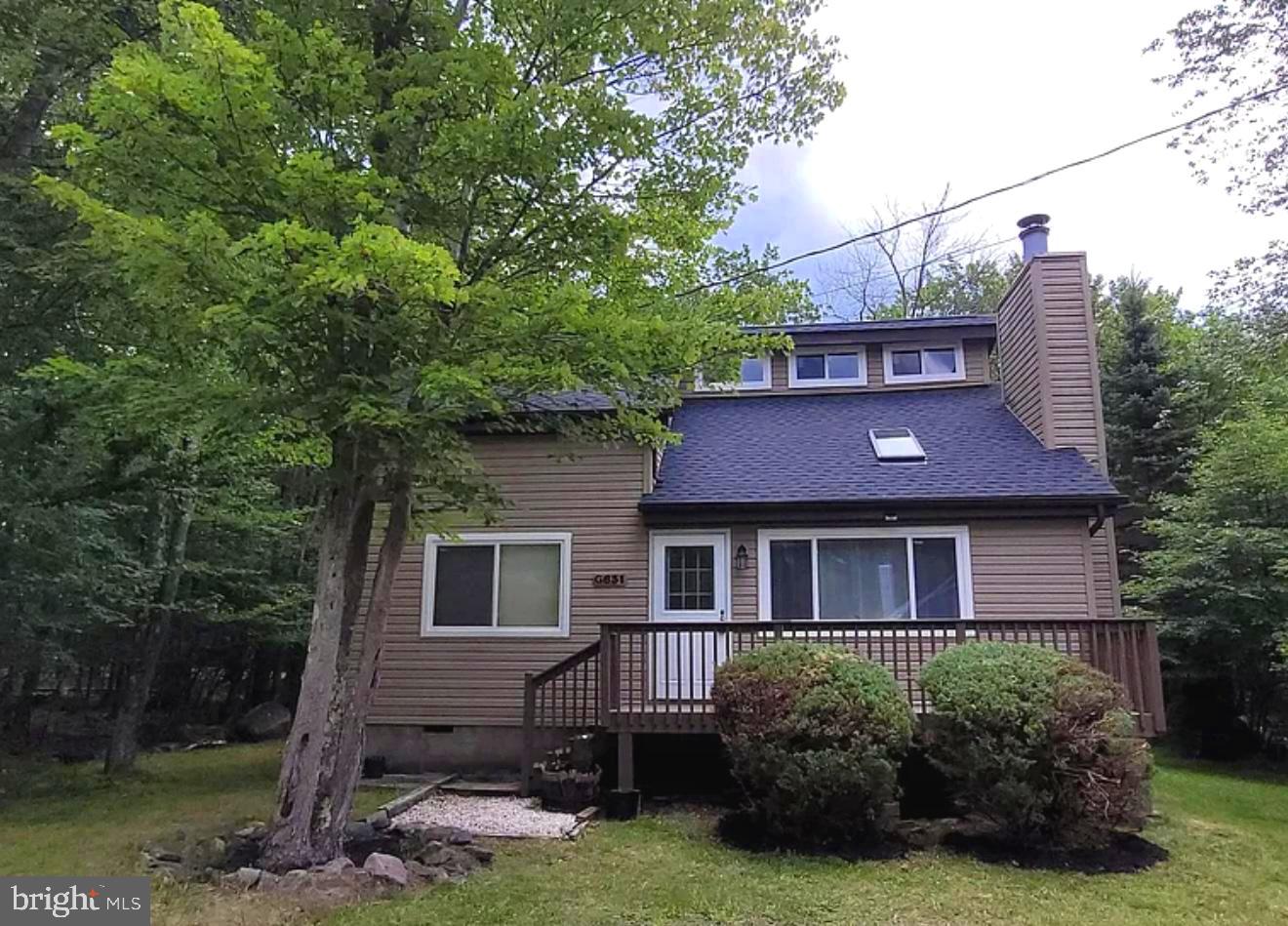 For sale is a very charming and cozy 3 bedroom/2-bathroom home in the Pocono Country Place Community. It was fully renovated recently and served as a successful short-term rental until the owner decided to rent it out long-term. Now that its vacant, it can be converted back to a short-term rental, owner occupied, or both! The Pocono Country Place community has so many amenities for you to enjoy, such as 4 swimming pools, 2 lakes with 1 beach, tennis/basketball court, mini golf, dog parks, 3 club houses, and much more! 24-hour gated community which provides added security. Stay here when you want to and Air BnB it when you aren't in town!! The taxes are very low. Selling furnished.