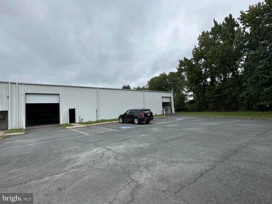 Very convenient 5000 sq.ft. warehouse/flex space for lease. Very convenient location just off US Route 50 with access from Woods Road and Church Creek Road. Large open space with two person doors and two drive in doors. The space is pre-plumbed for two restrooms. Tenant can modify the space adding offices, etc. Tenant takes care of water, trash removal and utilities. Landlord takes care of taxes, insurance, grass and snow removal.  18' ceiling height.