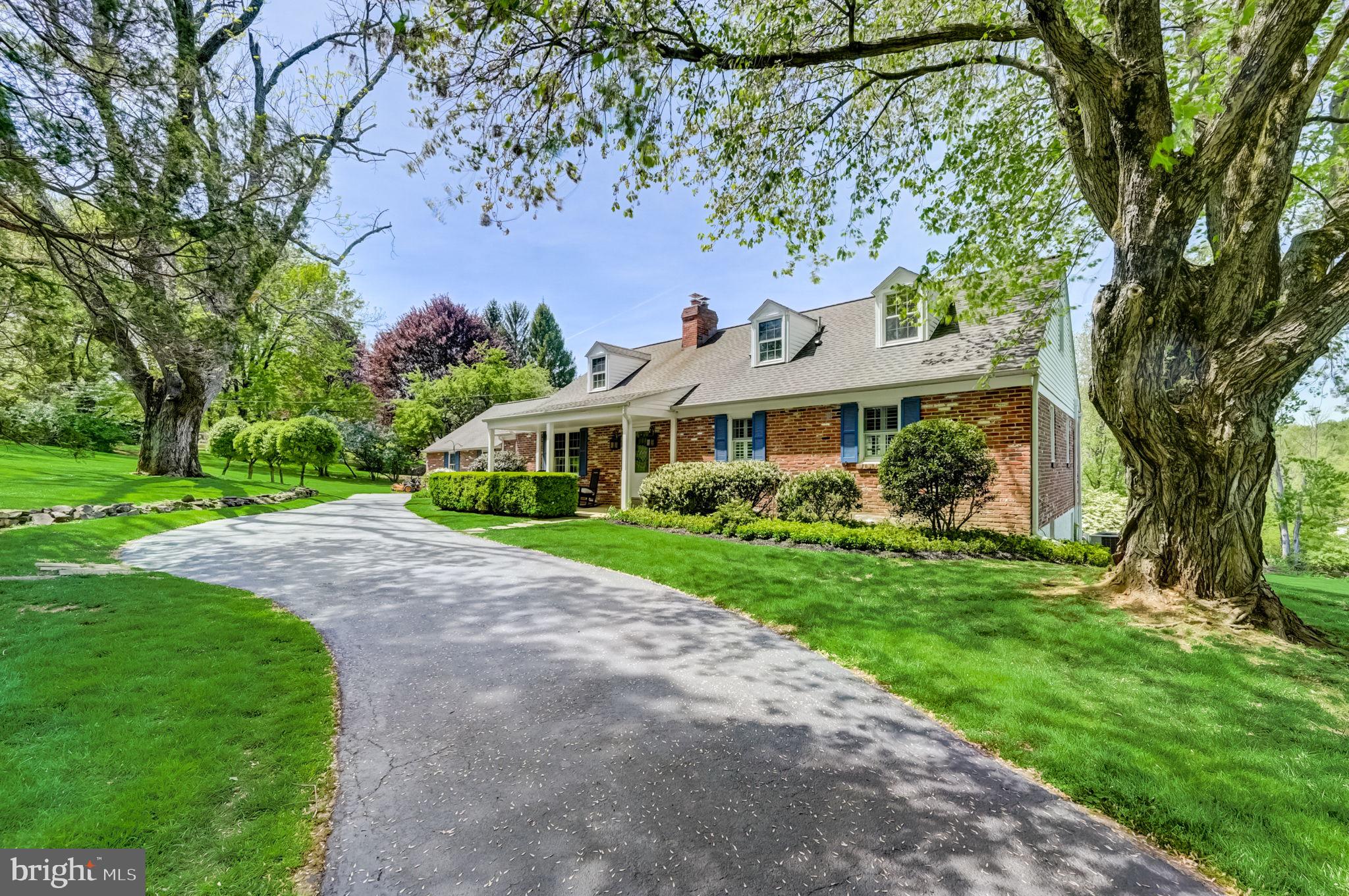 Beautifully updated 5 bedroom, 3.1 bathroom home sitting on a 2+ acre lot in desirable Radnor Hunt and top rated Great Valley School District! This exceptional property offers wide plank oak hardwoods recovered from a barn in Kentucky; custom, gourmet kitchen with inset cabinetry, island seating, and commercial grade appliances including two dishwashers; attached dining area with coffered ceiling that overlooks the impressive family room with vaulted, beamed ceiling, stone gas fireplace, and french door to the screened porch; a cozy formal living room with additional stone wood burning fireplace; and mudroom with wall of built-in cubbies, powder room and large laundry room. The rest of the first level consists a primary bedroom with an ensuite tiled bathroom and two spacious bedrooms that share a tiled hall bathroom. The second level offers two more bedrooms and share a third full bathroom. The lower level with walkout access, offers even more living space and has a separate bonus room that can be used as an additional bedroom, office, etc. The exterior is not to be missed with a flag stone patio that overlooks the beautiful fenced pool area. All of this while being close to all major roadways for an easy commute to Philadelphia proper and airport, minutes to Paoli and Malvern Brough train stations with an Acela line, and close to some of the best private academies in the country- Epis. Academy, Malvern Prep, and the Agnes Irwin school, just to name a few. Call today to see this magnificent property; it is not to be missed!