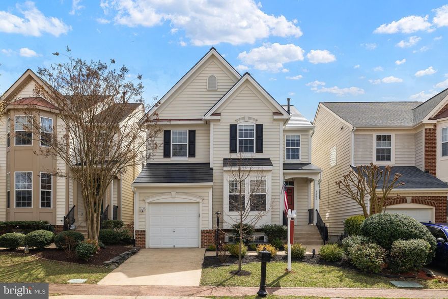 Welcome to this beautifully maintained and updated home on Graysons Mill Lane, featuring numerous upgrades and modern amenities. From the street you’ll notice the Tesla Solar Roof which powers the home and reduces your power bills. Sellers will transfer the Renewable Energy Credits (RECs) contract generating approximately $30-$60 per month, along with the full roof and solar warranty. On the main floor hardwood floors have been extended into the airy two-story family room filled with natural light, along with fresh paint throughout. Enjoy cozy evenings by the gas fireplace in the family room which opens into the updated kitchen boasting new high-efficiency stainless steel LG appliances, quartz countertops, and bright white cabinets. 

The second floor has upgraded plush carpet and hardwood in the primary bedroom. The fully renovated primary bathroom features WIFI controlled heated porcelain floors, quartz countertops, soaker tub, and dual shower heads. An upstairs laundry with high-efficiency washer and dryer is conveniently located adjacent the three upstairs bedrooms.The spacious fully finished basement includes a fourth full bedroom, office or den, full bath, wet bar, and walk out. From the Trex deck or basement you can walk out into the freshly sodded yard and enjoy the relaxing brick patio. Additional home upgrades include an updated high-efficiency AC and furnace unit under warranty until 2030, a Tesla car charger in the garage, LED lighting, updated fixtures throughout, and Nest smart thermostat. A Ring video doorbell is included, with the option to transfer the alarm system. 

This home is located in the sought-after Lorton Station Community, residents have access to two pools, numerous trails/paths, basketball courts, tot lots, and community events. The home is in close proximity to restaurants in the Lorton Station Town Center and across the street from the Lorton Virginia Railway Express (VRE) Station. Just 5.6 miles to the Franconia-Springfield METRO Station on the blue line, and the Harrover Pl & Lorton Station B bus stop is 0.2 miles away in the neighborhood. This is the perfect location conveniently located right off I-95 near Ft. Belvoir, NGA, Burke Lake Park, Laurel Hill Golf Course, Occoquan Historic District, Lorton Marketplace, Liberty Market, schools, restaurants, and museums. Schedule your tour today!