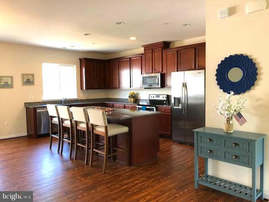 Beautiful, luxury 3 level home with garage with great location. 42" high kitchen cabinets, huge island and pantry,  granite countertops, a spacious modern & open home design, his & hers master bathroom vanities, walk-in closet, high ceiling, recessed lighting & tall windows brighten the house. Garage with paved driveway and plenty of visitor parking spaces. Close proximity to Fort Belvoir, Quantico Marine Base, VRE, and major roads (I-495&Rt-1).