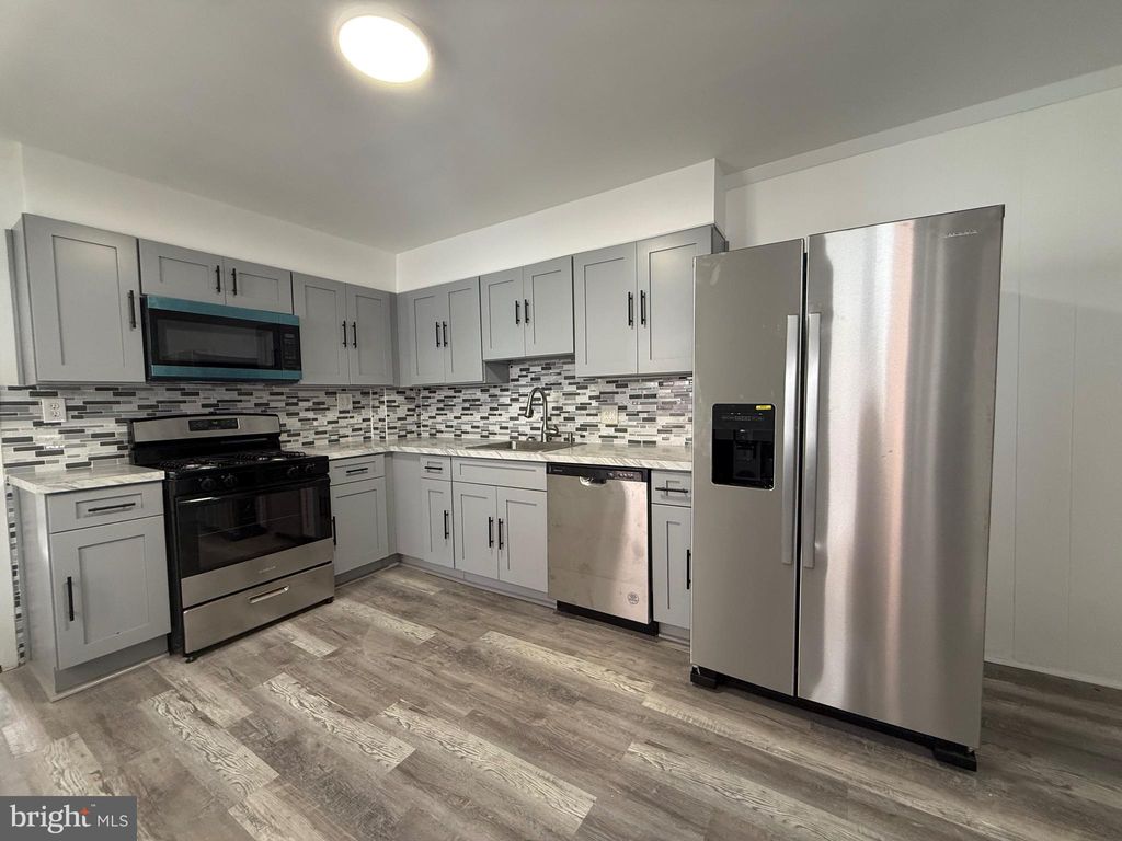 Photo of 221 Cleveland Street, BRISTOL, PA 19007 (MLS # PABU2101492)