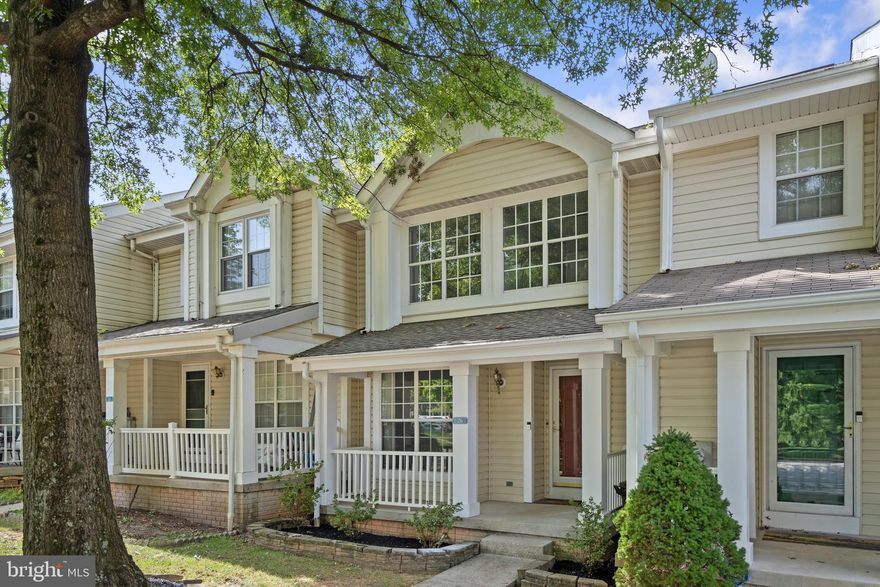 **Offer Deadline: 1pm on 9/26** Great opportunity to own a bright and spacious fully renovated porch front townhome in the Whispering Meadow Community. Freshly painted and tastefully designed with new modern fixtures, finishes and amenities. On the main level are gleaming wood floors throughout the living and dining room with LED statement lighting, and a center room 2-sided fireplace separating the spaces.  The eat-in gourmet kitchen has ceramic flooring, sleek granite countertops, a breakfast bar for quick bites, stainless steel appliances with electric range cooking, and a pantry for all your kitchen necessities. A coat closet and powder room on the main level allows for added convenience! Upstairs features new hardwood flooring and ceiling fans in all the bedrooms The Primary Suite features a spacious walk-in closet, double vanity, modern tile floors, and a tub shower to relax in after a long day. There are 2 more generously sized bedrooms and a full bathroom in the hallway. On the fully finished lower level is a large family room that is great for entertaining, a full bathroom with a jetted soaking tub and shower, a laundry and storage room, and a walk out to the new paver patio in the backyard. The large Trex Deck off the main level is the perfect place to host Summer BBQs. The house backs up to beautiful trees and the land will never be developed, so you will always enjoy relaxing, and entertaining family and friends. Parking is convenient with 2 assigned spaces in front of the house. The community is close to nearby shopping, dining, and commuter transportation, with easy access to 795 and 695. Schedule your tour today!