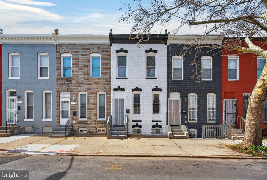 If you are looking to live in Baltimore city in a fully renovated home, this beautiful townhome located at Broadway East neighborhood is now available. Conveniently located with in 10 min from Penn Station, Charles Center and 30 min from BWI airport. This three finished level home offers 5 bedrooms and 3 full bathrooms, providing plenty of space and flexibility. The main level features a bright open-concept layout highlighted by a stylish accent walls and a brand-new kitchen complete with a modern peninsula, quartz countertops, stainless steel appliances, custom backsplash, recessed lighting, and contemporary finishes throughout. The upper level offers three bedrooms which includes a primary suite with a private full bathroom for added comfort and privacy. The fully finished lower level provides additional living space with two nicely sized bedrooms, a full bathroom, and washer and dryer included . This move-in-ready home combines modern updates with a convenient city location, making it a great opportunity!. Schedule your showing today!