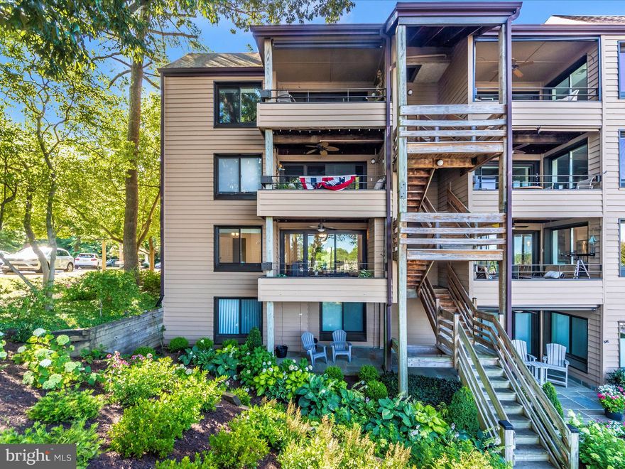 First floor 1 Bedroom, 1 Bath condo is a perfect "home away from home" or a great primary residence  that is easy to maintain, no outside maintenance worries.  This  waterfront community  "The Point", located on Spa Creek  is a water taxi ride to Annapolis to shop, dine,  and enjoy all the festivities, events and local Annapolis vibe.  Recent upgrades include: new carpet, freshly painted, renovated bathroom and new kitchen appliances.  Wood burning fireplace with marble tile, custom built ins, recessed lighting.  Waterfront views from every room.   Pella sliders in the living room area  lead to a covered deck, a perfect spot  to relax, unwind  catch a  view of an amazing sunset. Another nice feature of this condo is a front patio  located off the dining area that allows for extra outdoor private space.  The community offers many amenities for those that enjoy outdoor lifestyle living.   Deep water boat slips, community clubhouse, outdoor pool, tennis/pickleball courts, EV charging, kayak/canoe rack.   A short bike ride, walk or water taxi to Annapolis shopping, restaurants and more.   Estate Sale - Seller to review all offers - Motivated!!!