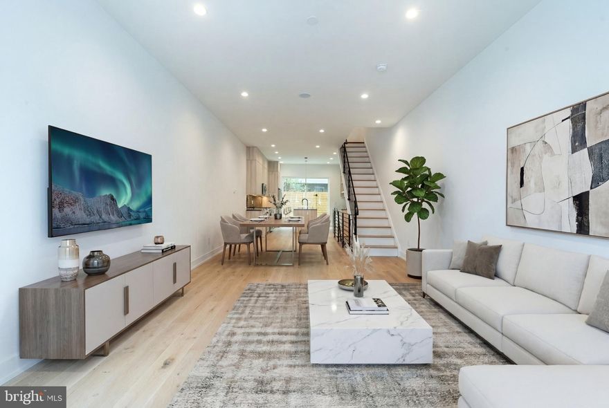 Welcome to 1144 S 18th St, nestled in the heart of Point Breeze, one of South Philadelphia’s most vibrant and rapidly growing neighborhoods. This stunning, fully reimagined home offers the feel of brand-new construction with only the original basement foundation remaining. Everything above has been newly built, and the basement has been fully renovated and finished as new, all with exceptional attention to detail and high-end finishes throughout.

Spanning approximately 2,550 square feet, this spacious home features 4 bedrooms and 4 full bathrooms, thoughtfully designed for modern living. The fully finished basement adds valuable living space, perfect for a media room, guest suite, or home office.

The main level showcases a beautifully designed kitchen with sleek cabinetry, stainless steel appliances, and a clean, modern aesthetic that flows seamlessly into the living and dining areas. Every detail has been carefully curated to deliver both style and functionality.

Step outside to a private rear yard, ideal for relaxing or entertaining. The second floor features two spacious bedrooms and two full bathrooms, while the third floor is dedicated to a stunning primary suite. Just before heading up to the rooftop, you’ll find a convenient wet bar, perfect for entertaining, leading to the incredible rooftop deck with breathtaking Center City views, creating the ultimate urban retreat.

Located in a prime South Philadelphia location, this home combines luxury, space, and outdoor living in one exceptional package.