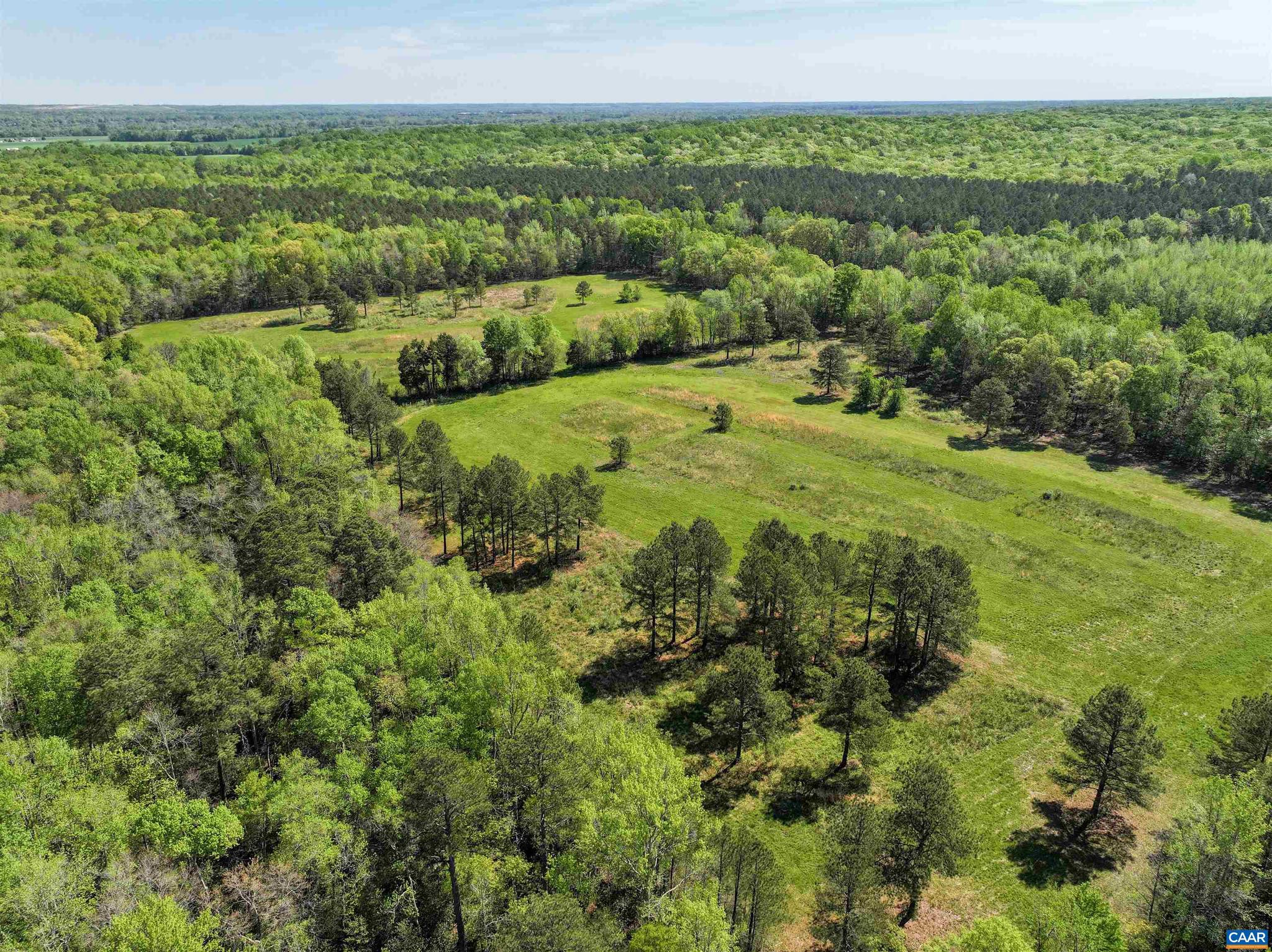 843� acres of exceptional hunting and recreational land, just 15 minutes south of Fredericksburg. Mount Sion has been carefully managed for wildlife over the past 20 years and trophy class bucks are regularly seen on the property. The property also features a 5-acre stocked pond, outstanding turkey hunting, and the potential for additional waterfowl habitat. The historic Mount Sion house dates to 1721 and was originally the home of James Madison's grandparents. The house has immense appeal, is structurally sound, and ready for a full renovation. Private and convenient, Washington, D.C. and Richmond can be both reached in 1 hour. Under conservation easement with three divisions possible.