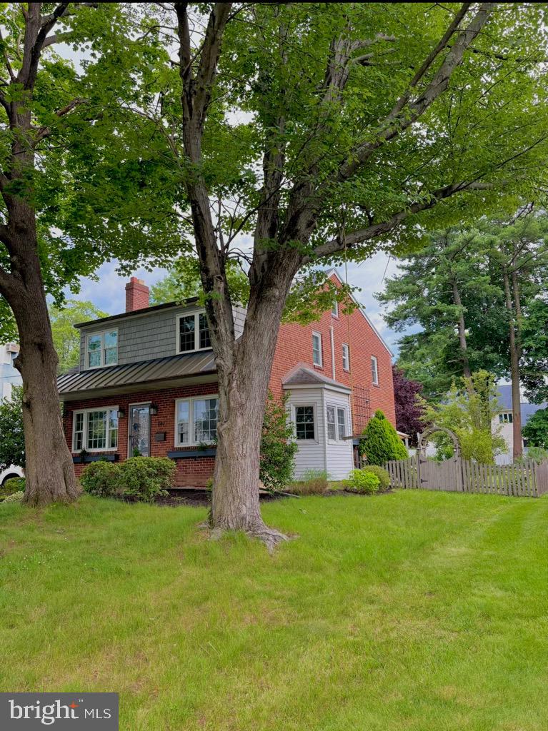 Welcome to 1147 Jericho Rd, a charming 4-bedroom, 2.5-bathroom home nestled in the heart of Abington, PA. This home boasts a fenced-in yard, perfect for outdoor activities, and a detached, heated 2-car garage with upgraded electric, ideal for car enthusiasts or those needing extra storage. Inside, you'll find wood floors throughout, adding a touch of elegance and warmth. The updated kitchen is a chef's dream, featuring handmade tiles, a custom-built hutch that was featured in Better Homes and Gardens, and modern appliances. The second floor is equipped with central air, ensuring comfort during those warm summer months. The primary bathroom has been tastefully remodeled, offering a serene retreat. Updated Anderson windows in the home ensure energy efficiency and plenty of natural light. For those chilly evenings, the wood-burning fireplace adds a cozy ambiance. The basement is a haven for DIY enthusiasts and hobbyists, offering ample space for projects. Great location that's an easy walk to Highland Elementary, Abington Junior and Senior High Schools, as well as Jefferson Abington Hospital, train station or shopping. Experience the perfect blend of comfort and convenience at 1147 Jericho Rd.