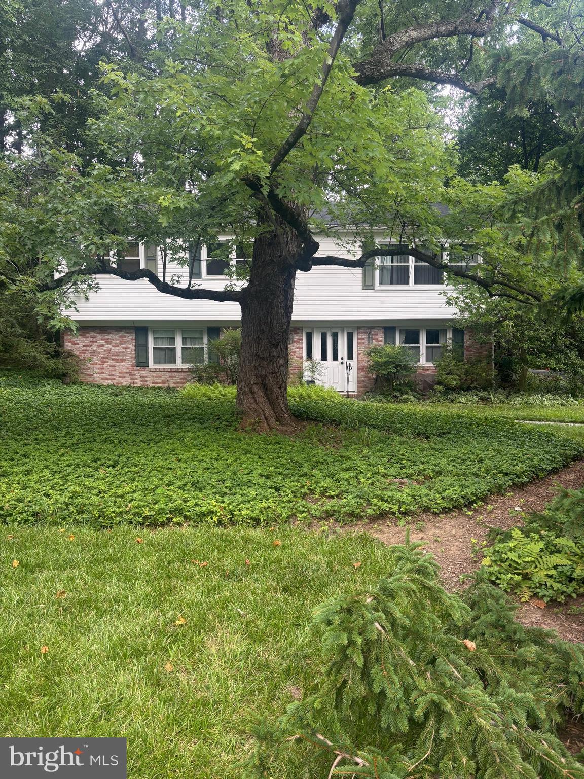 Located in one of the area's sought after neighborhoods, this 4 -bedroom, 2-bath home offers the perfect combination of privacy, charm and convenience. Nestled on a private wooded lot, the home features a bright and airy sunroom that overlooks the serene backyard-an idea spot to enjoy nature in every season. The private deck area is a quiet spot to enjoy a morning cup of coffee or just take in the scenery.
Inside, you will find hardwood floors, comfortable living spaces and a wood burning stove adds warmth on those cold winter nights. Updated windows and roof, no HOA and lots of space for your added touches.
Experience the best of Ellicott City living with easy access to schools, shopping, dining, and access to major highways.