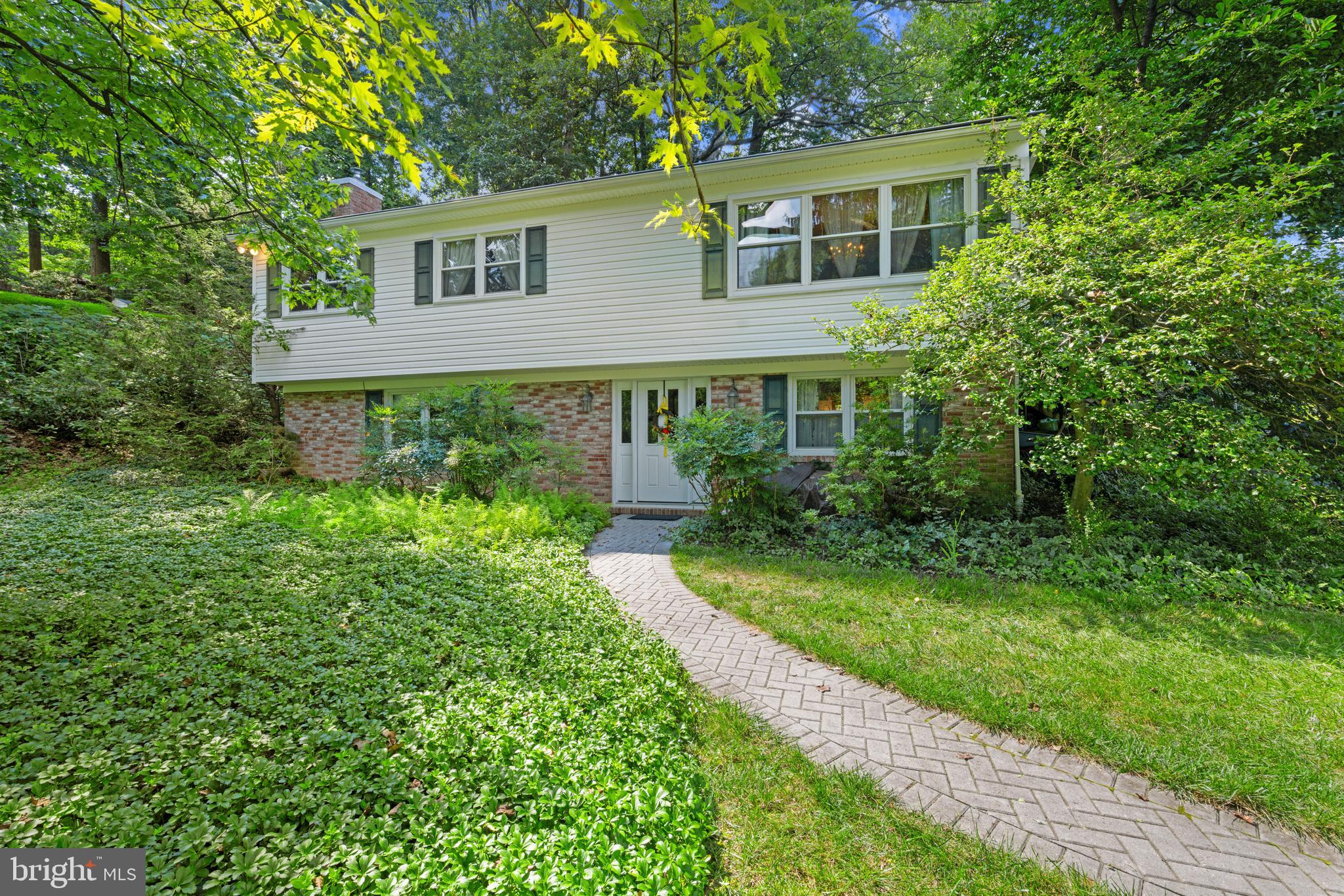 Located in one of the area's sought after neighborhoods, this 4 -bedroom, 2-bath home offers the perfect combination of privacy, charm and convenience. Nestled on a private wooded lot, the home features a bright and airy sunroom that overlooks the serene backyard-an idea spot to enjoy nature in every season. The private deck area is a quiet spot to enjoy a morning cup of coffee or just take in the scenery.
Inside, you will find hardwood floors, comfortable living spaces and a wood burning stove adds warmth on those cold winter nights. Updated windows and roof, no HOA and lots of space for your added touches.
Experience the best of Ellicott City living with easy access to schools, shopping, dining, and access to major highways.