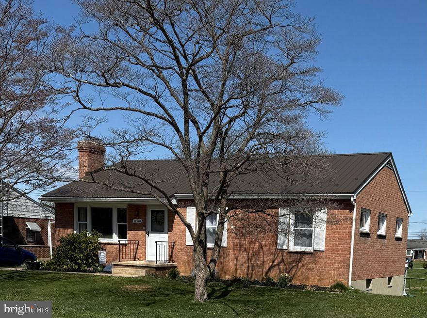 Very meticulously maintained all brick rancher in sought after Oak Ridge Development.  NO HOA!  New 50 year metal roof,  gutters, downspouts and flashing. Fall in love with the beautifully remodeled kitchen.  Kitchen features a double oven, convection oven with air fryer.  The main bathroom has also  been updated and remodeled including  double sinks, and  mosaic tile flooring.    Eat in kitchen,  large living room with fireplace , 3 bedrooms, 2 bathrooms and hardwood floors throughout. There is a large partially finished,  walkout basement has  additional storage and a large family room! Home has radon mitigation system.  One car garage with remote control and plenty of parking. Located close to I81 and I70, very close to the Valley Mall and many other amenities.  Welcome Home!  Please don't let the cat outside.