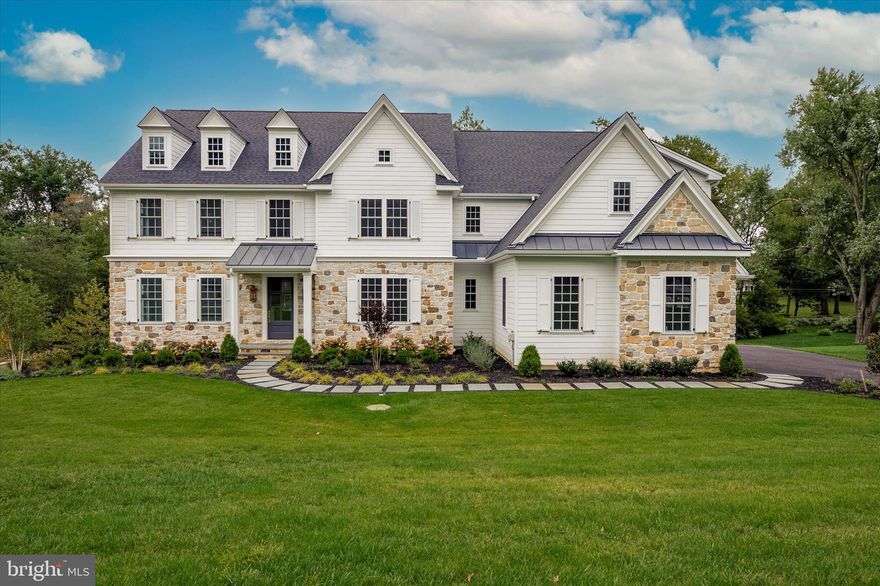 Welcome to 1052 Prescott Rd, a new custom built home by Moser Homes and Achristavest Home Builders offering 5 bedrooms, 5.2 bathrooms and sits on an amazing 1 acre lot in a highly sought after Main Line Berwyn location in award winning Tredyffrin-Easttown School District! Tucked away on a spectacular street with custom built homes surrounding, this home does not disappoint.  Fall in love with the light and bright stone exterior and classic white Hardi siding this beautiful home exudes. Step inside to find an expansive 2-story foyer completely open to the lower level! This traditional yet open floor plan is endlessly adaptable to modern lifestyles.  The main level offers 5in oak flooring and 10ft high ceilings throughout; a formal living room with built-in shelving, gas fireplace, coffered ceiling; a formal dining room with adjoining butler’s pantry for extra storage and serving space; and chic study with walls of windows allowing plenty of sunlight. The heart of the home is the incredible, gourmet kitchen with custom floor to ceiling inset shaker cabinetry, 12ft island, stainless steel Thermador appliances, porcelain counters, and adjoining breakfast room with sliders to one of two welcomed decks; the perfect place to enjoy a cup of coffee to start your day. Flowing from the kitchen, you overlook the cozy yet spacious family room with custom gas fireplace, and access to the 2nd deck, an incredible 3-season screened in porch equipped with vaulted ceilings/recessed lighting/gorgeous cedar ceiling/electrical outlets and ceiling fan; the perfect place to unwind with a nightcap. The main level is complete with two powder rooms and the mudroom room/storage area off of the 3-car garage. Continuing on to the second level, you will be greeted by a stunning primary suite with huge walk-in closet and luxurious ensuite bathroom with dual vanities, soaking tub, and frameless glass enclosed shower; two additional ensuite bedrooms with private tiled bathroom; two other spacious bedrooms which share a jack and jill bathroom with dual vanities and tub/shower combo; and a laundry room with cabinetry and counter space. Last but not least is the finished massive walk-out lower level designed as a bonus room for additional living space and offers a full bathroom while also offering an unfinished space that could be used for a gym and storage. The rear yard offers magnificent views and plenty of room to put in a pool if desired.  This home is a private oasis for those who love the quiet of nature while still being centrally located to a wide variety of Main Line dining and shopping options, Paoli train station for an easy commute to Center City, easy access to all major roadways, TE Schools and minutes to the finest private schools. Don’t miss this rare opportunity to own this incredible home in a truly desirable Berwyn location!