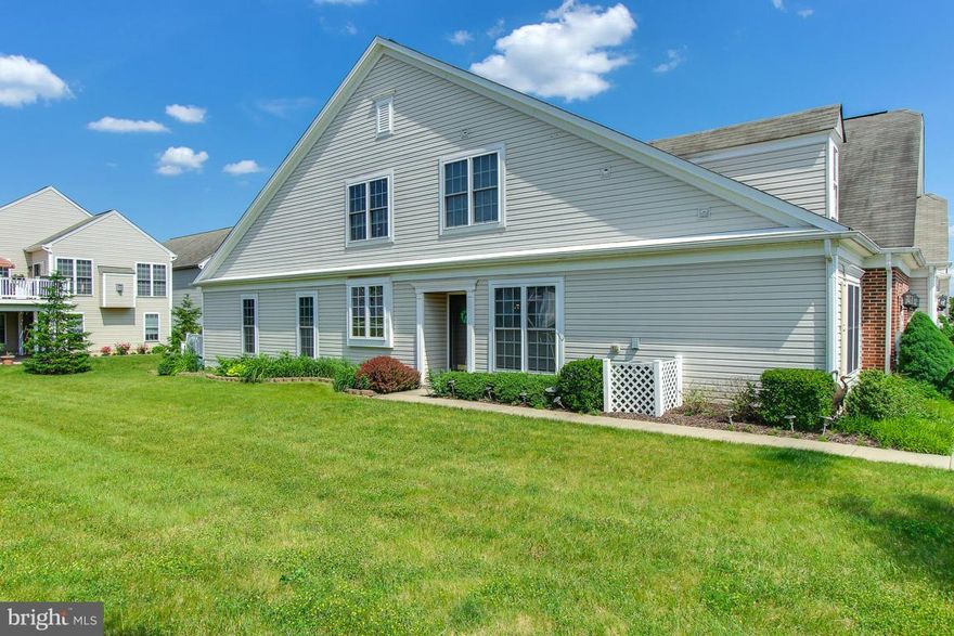 Great condition end of triplex with extra yard space.Lots of extras including deck, sunroom, and fireplace. All appliances stay  2 bedrooms/2 baths and den on first level plus bedroom and bath in loft area. Don't miss out on the many advantages of the 55+ Carroll Vista community.