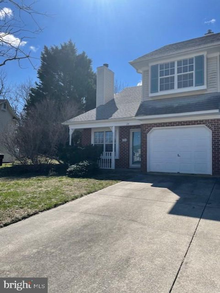 Looking for a starter home or to add to your rental portfolio? Welcome to 24 Gristmill Drive in the established community of Millcreek! This 3-bedroom, 1.5 bath duplex is located in a country setting but with all of the conveniences of the City of Dover services. Enter into the home you will notice the pitched cathedral ceilings w/ bay window and wood burning fireplace.  The kitchen offers plenty of counter space and cabinetry w/ all appliances included but and being sold As-Is. Situated between the kitchen and dining area is a large pass-through window. Sliders from the dining room lead to a covered, screen porch. This space could be enclosed to add additional living space. The spacious fenced yard backs to a private wooded area. Completing the 1st floor, a powder room, laundry room, storage closet (which could be converted into pantry) with access to the one car garage. Head upstairs to find the main bedroom with two roomy closets and two other nicely sized bedrooms with a full hall bath. The home is conveniently located to Bally's Casino, DAFB, medical facilities, schools, restaurants and shopping with easy access to RT's 1 and 13. Schedule your tour today!