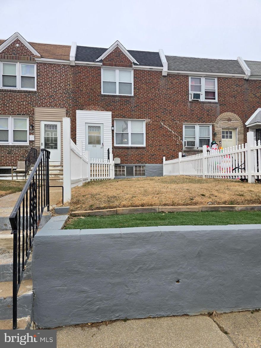 Welcome to 6248 Revere Street, a beautifully maintained townhouse nestled in the heart of Philadelphia's desirable Mayfair neighborhood. This charming home boasts 2 bedrooms and 1 full bathroom of comfortable living space. 

As you approach, you'll be greeted by a well-manicured front lawn and patio, perfect for enjoying morning coffee or evening relaxation.  Step inside to discover a spacious living room that flows seamlessly into a separate dining area, both adorned with beautiful laminate flooring. The updated kitchen features modern appliances, including a gas range, dishwasher, and refrigerator, complemented by hardwood-style flooring. 
The upper level offers two generously sized bedrooms with ample closet space and large windows that bathe the rooms in natural light. The finished basement serves as a versatile space, providing an additional bedroom and full bathroom, ideal for guests or a home office. 

Parking is a breeze with a private driveway, home also located on a llarge block that offers parking on both sides of the street ensuring convenience for homeowners and visitors.

 The home's location is a commuter's dream, situated just blocks from Route 1 and I-95, offering easy access to Center City Philadelphia.  Residents will appreciate the proximity to a variety of amenities, including:

Restaurants: Enjoy diverse dining options within a short distance.

Bakeries: Satisfy your sweet tooth at nearby local bakeries.

Supermarkets: Convenient grocery shopping is just minutes away.

Shopping Centers: Explore retail therapy at local shopping centers.

Don't miss the opportunity to own this delightful home that perfectly blends comfort, convenience, and community. Schedule your showing today!