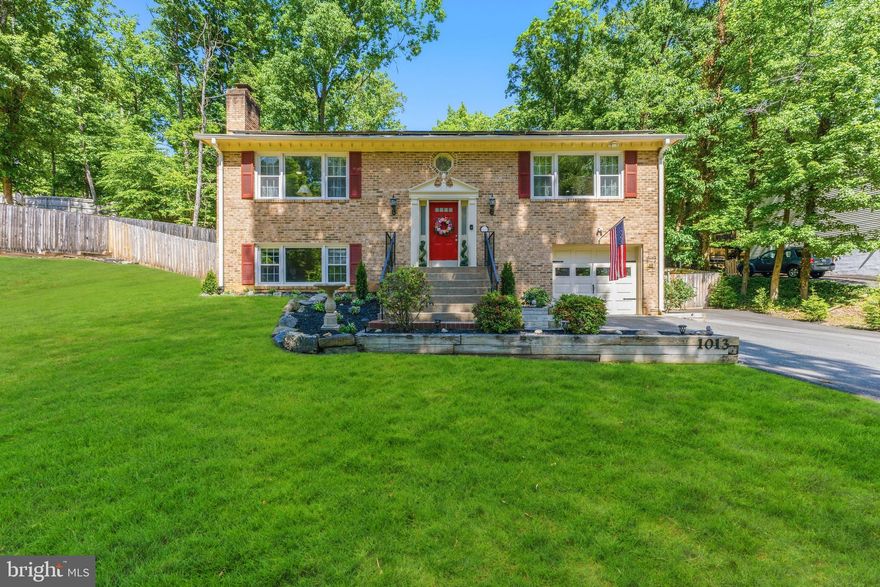 Beautifully updated 3BR, 3BA brick front split foyer located in the desirable FIRST section of amenity-filled Aquia Harbour and less than 1/2 mile to the main gate for easy access! This home combines comfort, functionality, and energy efficiency with an OWNED 9,620 watt solar system designed to help reduce monthly electric costs.
The main level features an updated kitchen with granite countertops, center island with seating, stainless steel appliances, pantry, and abundant cabinet space. The adjoining dining area offers hardwood flooring and direct access to the screened porch and rear deck perfect for relaxing or entertaining while overlooking the fully fenced backyard. The spacious primary suite includes private deck access and an attached bath, while an additional bedroom and full bath complete the upper level.
The finished lower level offers flexible living space with a cozy family room featuring a wood-burning fireplace with pellet stove insert, third bedroom, full bath, laundry area, and bonus storage/workshop space with potential for conversion back to garage parking.
Additional highlights include hardwood flooring,  architectural shingle roof, extra-wide driveway, screened porch, rear deck, fully fenced backyard, and a .38-acre lot.  Recent updates including an approximately 3-year-old HVAC system with smart thermostat and new duct work, newer water heater, 1-year-old garage door and opener, new basement flooring, plus new ceiling fans in the living room and all bedrooms! Enjoy all Aquia Harbour has to offer including two pools, marina access, golf, walking trails, parks, playgrounds, tennis and basketball courts, horse stables, dog park, community events, and 24-hour gated security—all in a commuter-friendly location convenient to I-95, Quantico, shopping, and dining. WELCOME HOME!