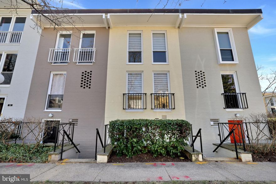 Experience the best of contemporary urban living in this fully renovated, light-filled three-level luxury condo in the highly desirable Capitol Park IV community. This beautifully updated home features two spacious bedrooms and a fully renovated bath on the top level, a gorgeous new kitchen with additional living space on the entry level, and a bright, open second level perfect for entertaining. Gleaming hardwood floors, elegant designer paint, and large front and rear windows enhance the sense of space and natural light throughout. Step outside to your private enclosed back patio/courtyard, a perfect retreat for relaxing or entertaining. Enjoy the community pool, adding a refreshing escape just steps from your door. Additional conveniences include an in-unit washer/dryer, an assigned parking space (#112), and a low condo fee that includes water/sewer. Located just steps from The Wharf, Nationals Park, Audi Field, and the best shopping, dining, and entertainment in the area, this home places you in the heart of one of D.C.’s most sought-after neighborhoods. Commuting is effortless with multiple Metro stations (Waterfront, Federal SW, and L’Enfant Plaza) within walking distance, along with easy access to Ft. McNair, Navy Yard, and downtown D.C. Surrounded by lush, tree-lined streets and a garden-like setting, this home offers a rare blend of tranquility and city convenience. Whether you're strolling along the waterfront, catching a game, or enjoying world-class dining, this location has it all