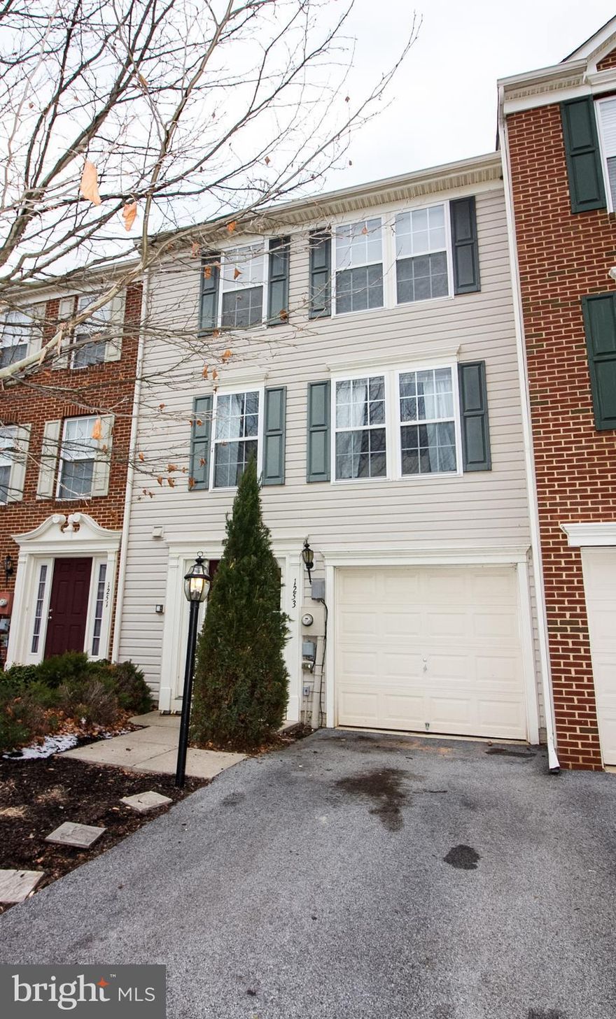 Wonderful opportunity to own this massive 2,400 sq ft townhouse in sought-after Fairfax Crossing! This home features a large extension on all 3 levels, hardwood, deck, patio, fenced yard, morning/sun room and a huge master bed/bath that you've been seeking! With all new carpet, paint & laminate on main level you'll feel like you are in a brand new home.  Priced to sell quickly so don't delay!