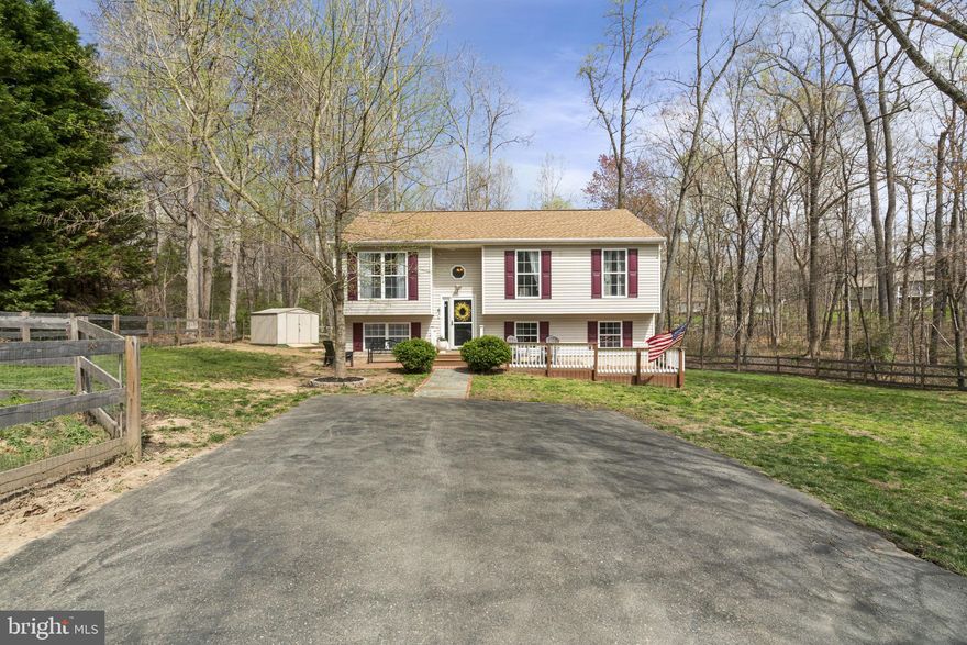 Welcome to 6 Laurel Lane in the non-HOA community of Hidden Lake.  This 4 bedroom, 2 bathroom charmer is updated and ready to welcome you home!   The split foyer home offers space to spread out on both levels with vaulted ceilings and open concept living on the main level.  The living space is bright and airy and flows into a large eat-in kitchen with update granite counters,  and stainless steel appliances.  As the weather warms, enjoy time on the spacious deck overlooking your fully-fenced backyard.  This level also offers 2 recently- painted secondary bedrooms that share a hall bath.  The Owner's Suite is spacious enough for a King size bed and has a convenient ensuite bath.
The lower level has been fully finished and has a sliding door for access to the backyard.  This level has been recently updated and is a great space for guests or multi-generational living.  The bedroom and living space have been recently touched-up with drywall fixes and fresh paint. The laundry room has been separated from the  utility area and finished off with new flooring and paint and also has great storage space as well.   
Don't miss the backyard that is perfect for pups and people alike.   With just under 1/2 acre, you have room to garden,  add an outdoor kitchen, or stargaze by the firepit.   
If you have been looking for a home that offers the space of a country retreat while still being close to shopping and major commuting routes, make sure you move 6 Laurel Lane to the top of your list.  


Roof 2021, HVAC 2021,  The list of updates and upgrades is extensive, please ask if you have questions