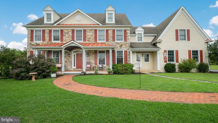 Welcome to 4602 Smith Road, a beautiful 4300+ sq. ft. custom home in Buckingham Township!  With its 5.6 acres, the property offers peace and privacy, yet is just minutes from shopping, schools and all that nearby Doylestown and Newtown have to offer.  Built by renowned Bucks County builder, John Arrow, the home features 4 bedrooms and 3.5 baths.  Upon entering, you're greeted with a two-story foyer with site-finished hardwood floors.  These same warm wood floors grace the powder room, family room, breakfast room, dining room and kitchen.   The living room features crown molding and has French doors leading to an expansive office with box bay window, providing a fantastic view of the backyard.  Another door from the office leads to the two-story family room with stunning stone, wood-burning fireplace and a wall of windows.  The kitchen is a true chef's delight with top-of-the-line stainless steel appliances, including a Thermador six-burner gas range, Viking refrigerator and Bosch dishwasher.  The painted wood custom cabinets are complemented with  granite countertops and the oversized island offers abundant seating.  The breakfast room enjoys that wonderful view of the backyard and the myriad of wild life, including from time to time deer and wild turkeys.  A door off the breakfast room leads outside onto a paver patio.   The sheer size of the formal dining room makes entertaining a crowd easy!  This beautiful room with crown molding can fit the largest of tables with ease. Completing the main level is a convenient, tiled mudroom that leads to the three-car garage.

Up a choice of staircases, the upper floor landing has an overlook to the foyer on one side and the family room on the other.  The primary bedroom is a private oasis.  This expansive space with sweeping views features a gas fireplace for cozy winter nights.  There is also a lovely sitting area to curl up with a good book.  The large, bright walk-in closet offers plenty of storage.  Another great spot is the primary bathroom with jetted tub and roomy tiled shower.  There are two additional spacious bedrooms that share a tiled Jack and Jill bathroom with double vanity.  The large fourth bedroom has a convenient, tiled hall bath just across the hallway.  A convenient laundry center with large storage closet completes the upper level.  

The full basement with egress has the rough-in for a bathroom and is ready for finishing.  There's also a whole house generator for peace of mind.  There are also all new carpets, as well as a new furnace.  The  property is part of the award-winning Central Bucks School District.  The  acreage this amazing home sits on offers a much-needed respite and its possibilities are many.  Plan a tour today!