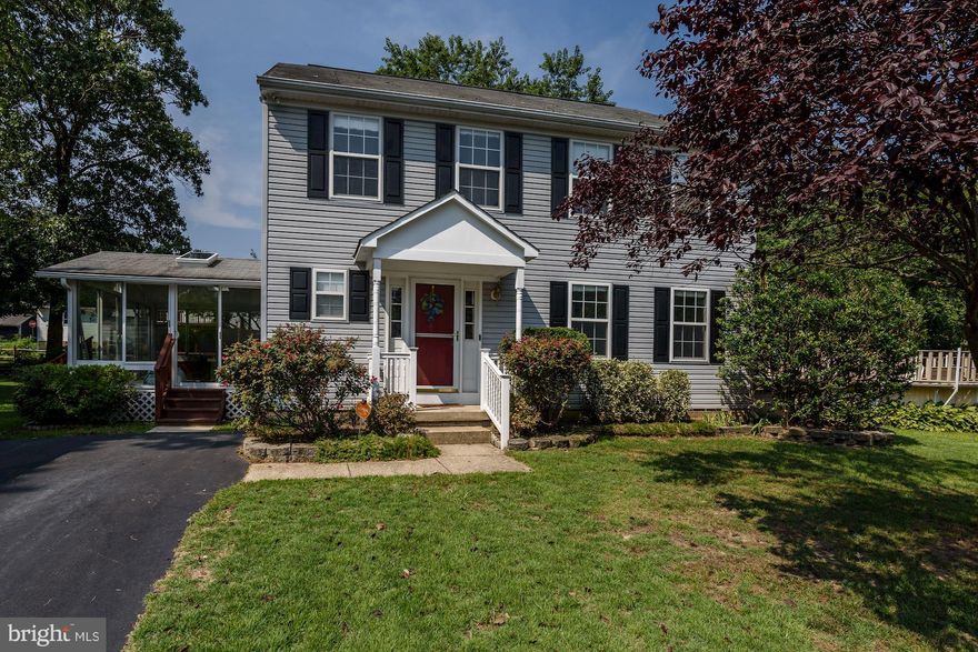 Beautiful Colonial in water acces Boulevard Park!  Features include a new roof, new windows, new carpet & paint, newer HVAC, & an all seasons room!  Huge master suite w/ walk in closet & bath, updated kitchen, finished lower level w/ family room, office/work room, could be 4th BR  & lots of storage. Large corner lot on a quiet street & 1 block to water! Community boat ramp & pier. Home Warranty!