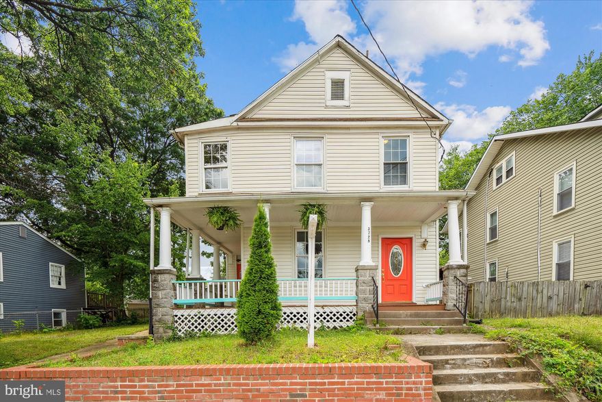 Enjoy cooling porch breezes this Summer in this roomy 1905 Colonial with a wrap-around porch!  It stands tall and inviting as you round the corner of the street.  The original 4 square had an addition added to give a really large owner suite and a roomy family room. The living room and separate dining room have bamboo floors that shine.  The granite kitchen with recent stainless appliances boasts lots of kitchen countertop space and cabinets. Notice the original tin ceiling to the kitchen with wood surround - this was retained when the home was renovated.  A new gas stove is featured, along with a dishwasher and built-in microwave.  The large family room with bamboo flooring has a large half bathroom with space to expand to a full for a guest suite when needed.  There's a shower too that also has space for a washer/dryer here.  Upstairs are two large bedrooms and a full bathroom plus a huge owner suite with a bathroom and walk-in closet.  Two zoned gas heating and central air conditioning are featured. This home is move-in ready with some finishing touches needed that can come later.  It's a lot of square feet for the dollar!  
Mount Rainier was Sustainable Maryland Certified in 2012 (one of only 4 towns then), after passing a "Going Green" ordinance, and has renewed its certification several times since.  It's also a Historic District, allowing for State Tax Credits for approved repairs/upgrades to buildings.  It offers small-town appeal in an urban setting that is a short ride away from Capitol Hill and the White House. Local Citizens take pleasure in the revitalization taking place around the City and the active engagement that promotes local pride there. You are a short stroll from the locally famous Glut food cooperative (since 1969) and Joe's Movement Emporium (dance, concerts, yoga, children's pre, and post-school programs), and the Arts District that stretches along the Route 1 corridor. Artists working from home in the City do not need a special license to work on and sell art from their home studios. Walk to Pennyroyal Station with New American Cuisine, Dodah's Kitchen Vegan restaurant, and Potomac Fish House. Artist studios are just down the street. You are a short drive from Pizza Paradiso, Franklin's Brew Pub, and Busboys and Poets. At nearby Fort Lincoln, there's a major shopping center and more restaurants anchored by a Costco. It's just over a mile from West Hyattsville Metro (Green Line) and with bus service nearby on Route 1 connecting to the Rhode Island Red Line Metro, and public transportation at that station. For bikers and nature lovers, there are miles of bike/hiking trails in nearby river parks that follow the Northwest Branch of the Anacostia River and connect into Washington D.C. like the Bladensburg Waterfront Park.
Hurry over to see how this house has room to spread out in a Historic town full of charm and right next to  the District of Columbia